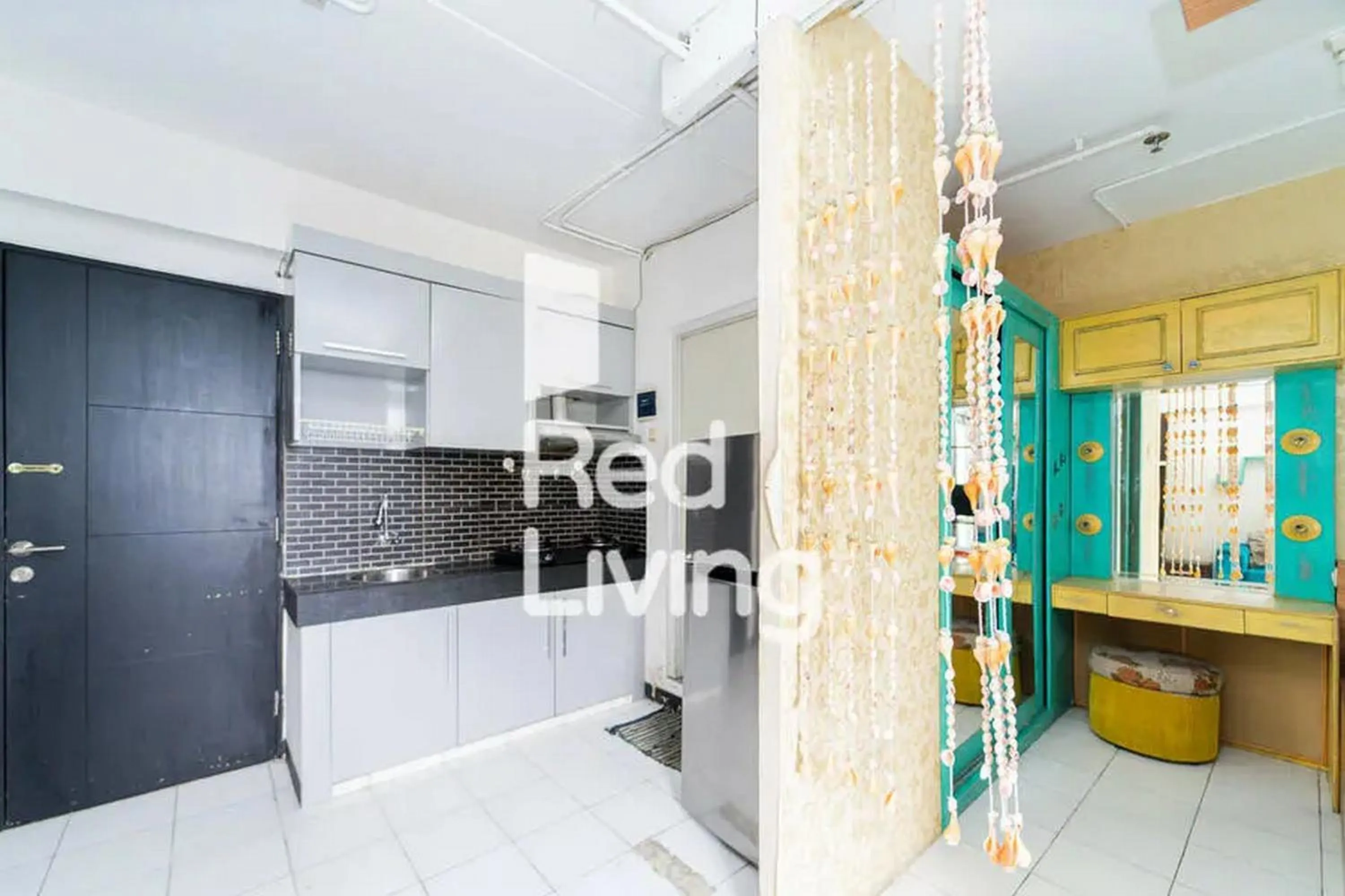 Kitchen or kitchenette in RedLiving Apartemen Sentra Timur Residence - Myroom id Tower Green