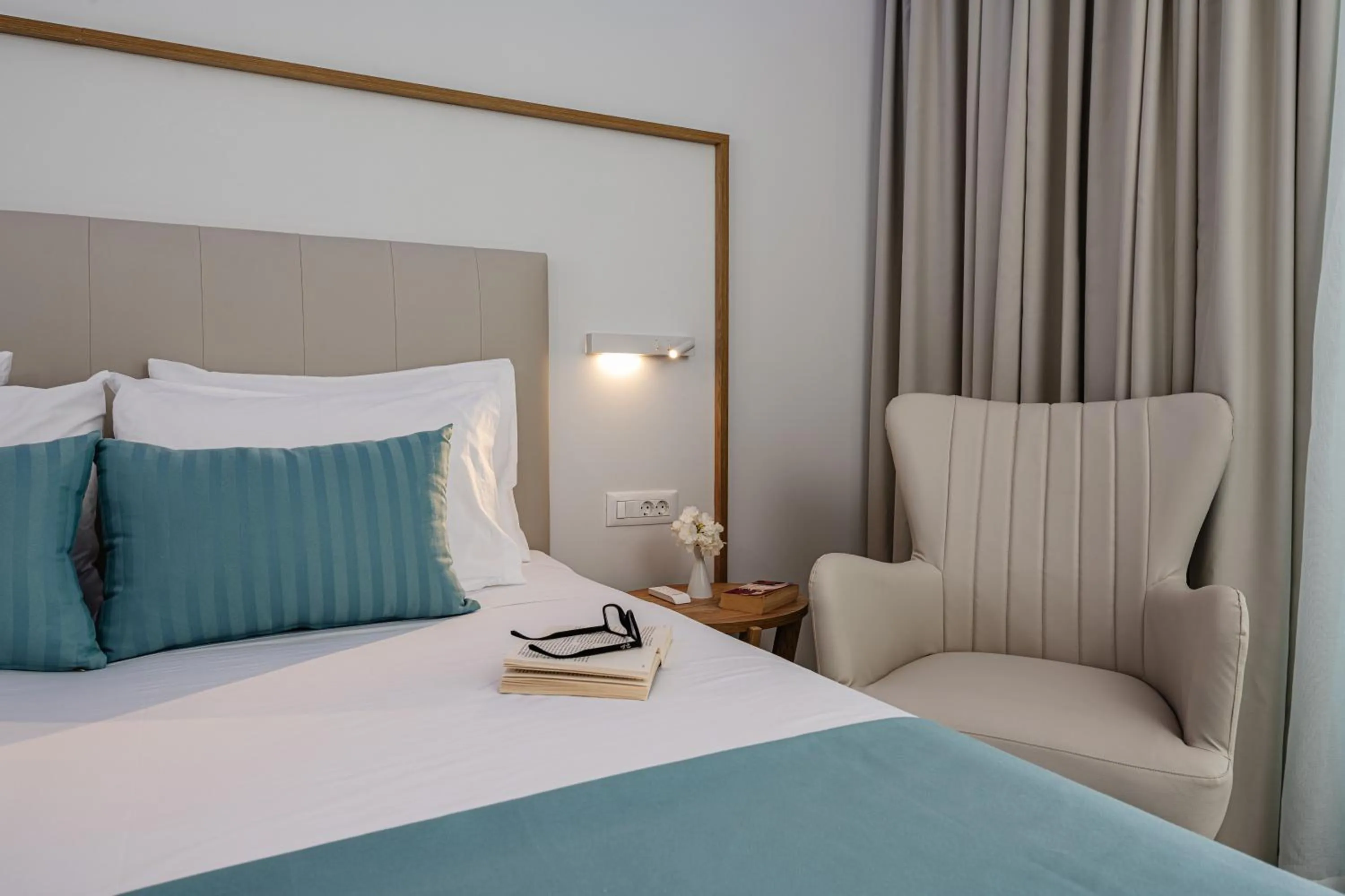 Bed in Mirage Bleu Hotel