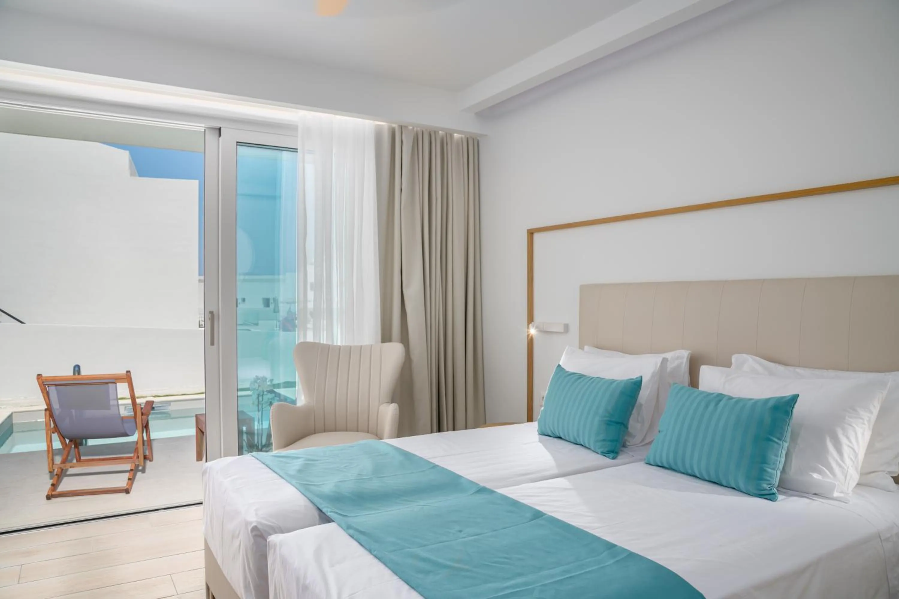 Bed in Mirage Bleu Hotel