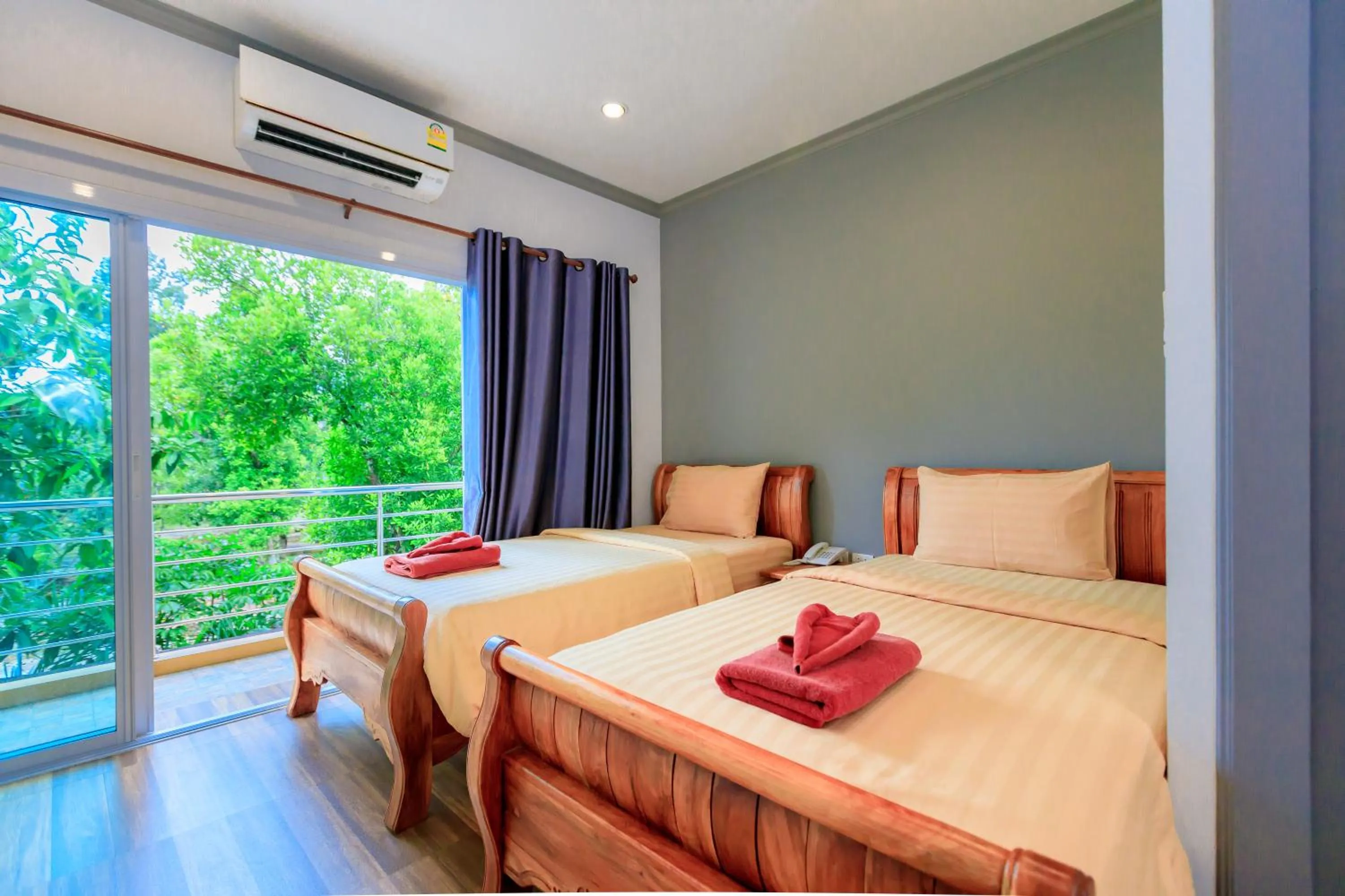 Bed in Saline Hot Spring Resort นำ้พุร้อนเค็ม รีสอร์ท