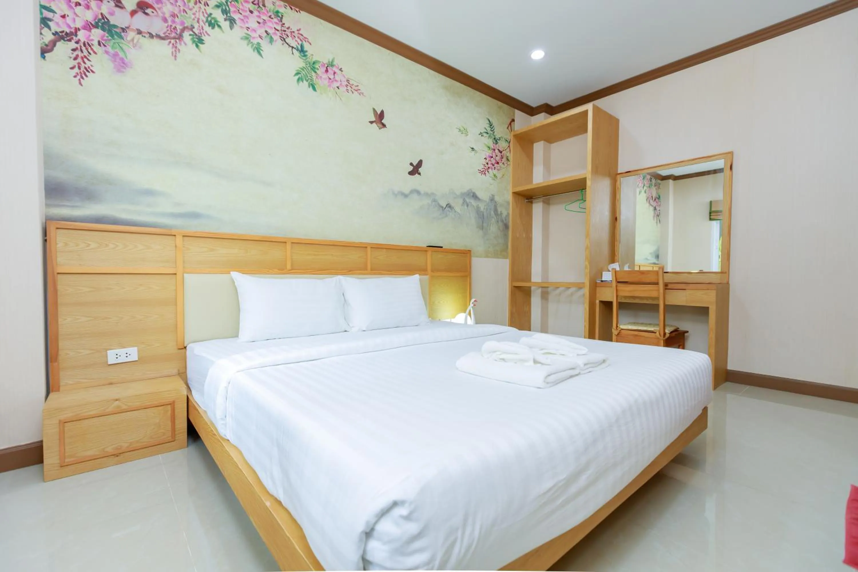 Bed in Saline Hot Spring Resort นำ้พุร้อนเค็ม รีสอร์ท