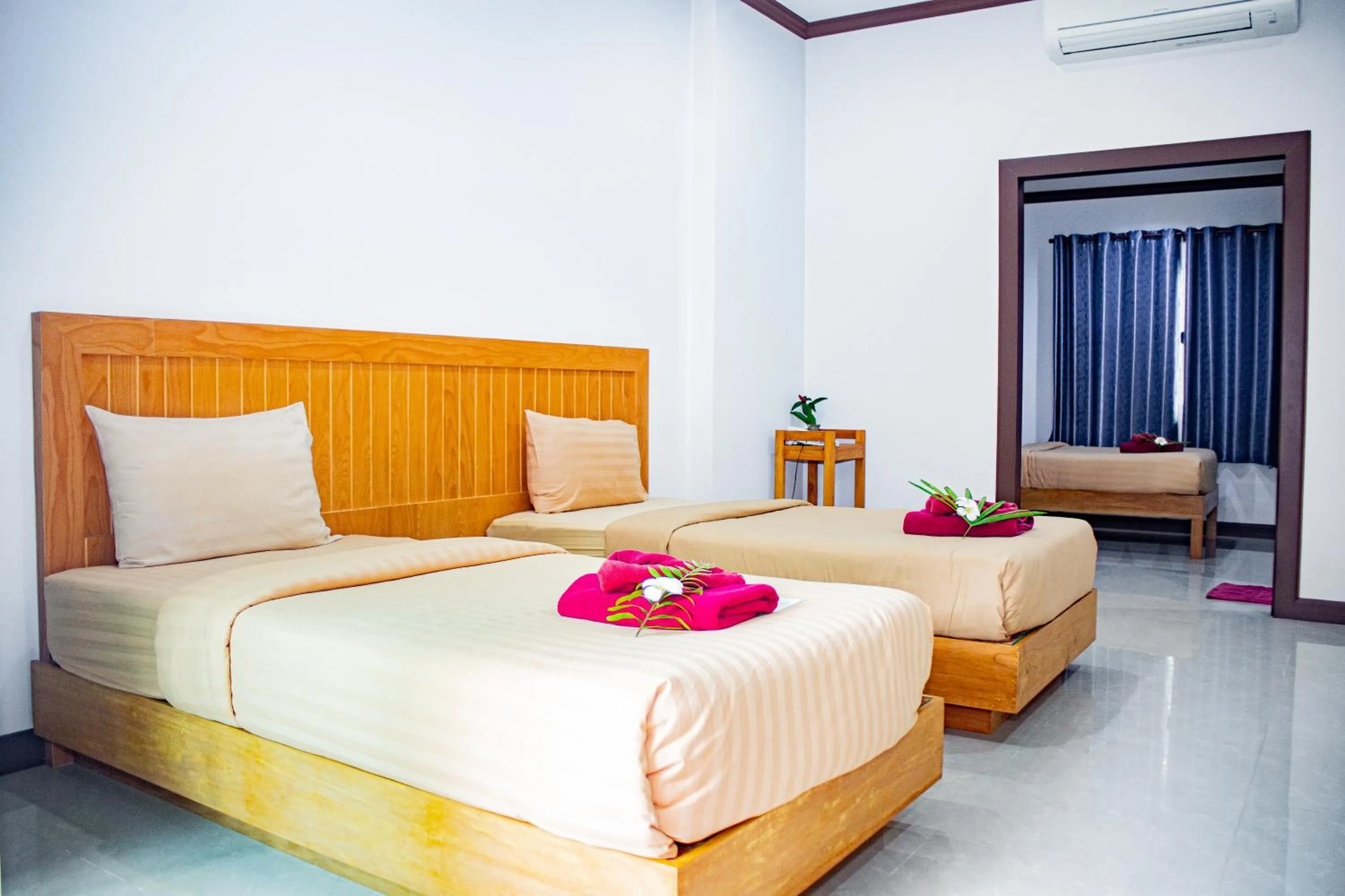 Photo of the whole room, Bed in Saline Hot Spring Resort นำ้พุร้อนเค็ม รีสอร์ท