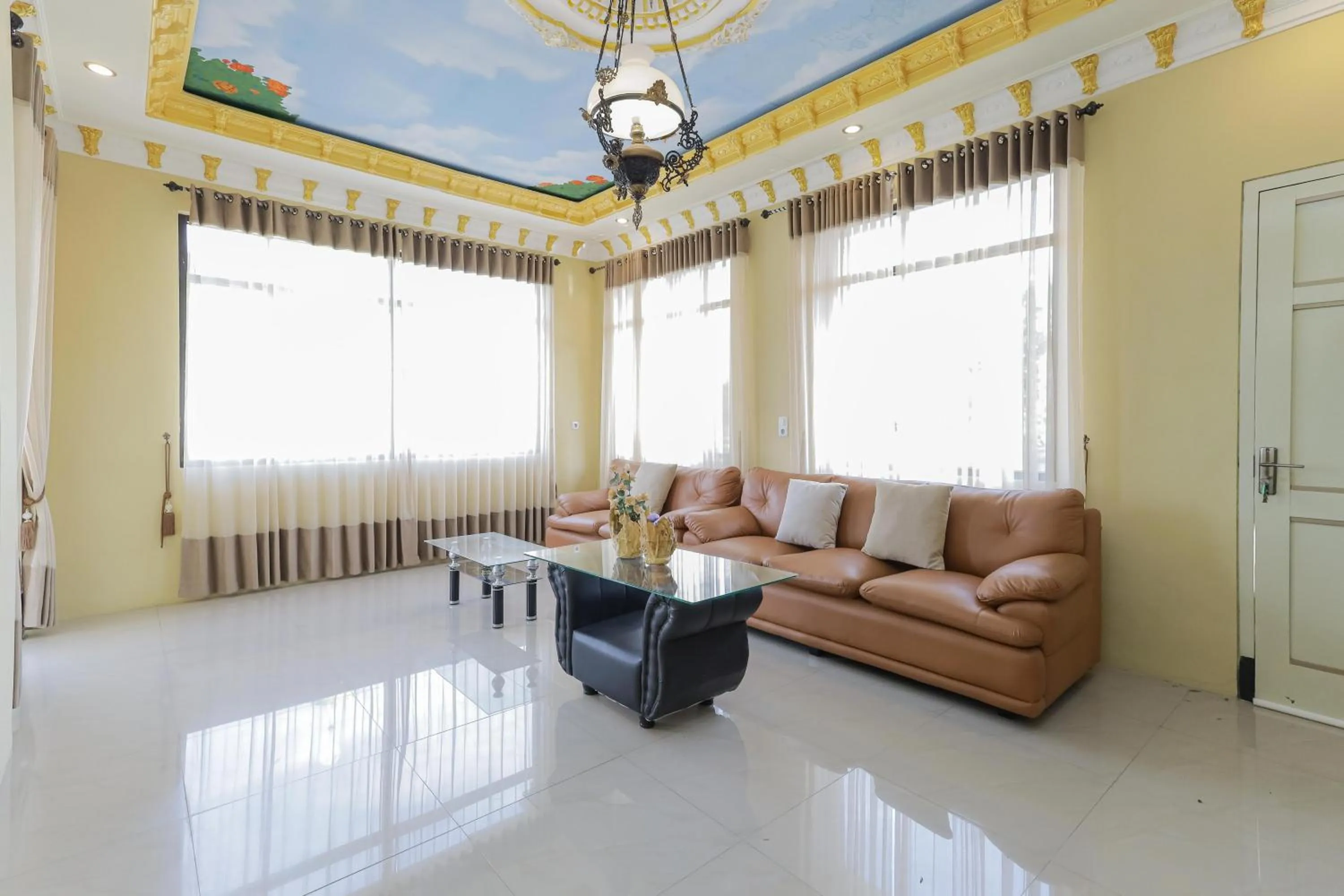 Living room in RedDoorz Plus @ Villa Bontes Batu