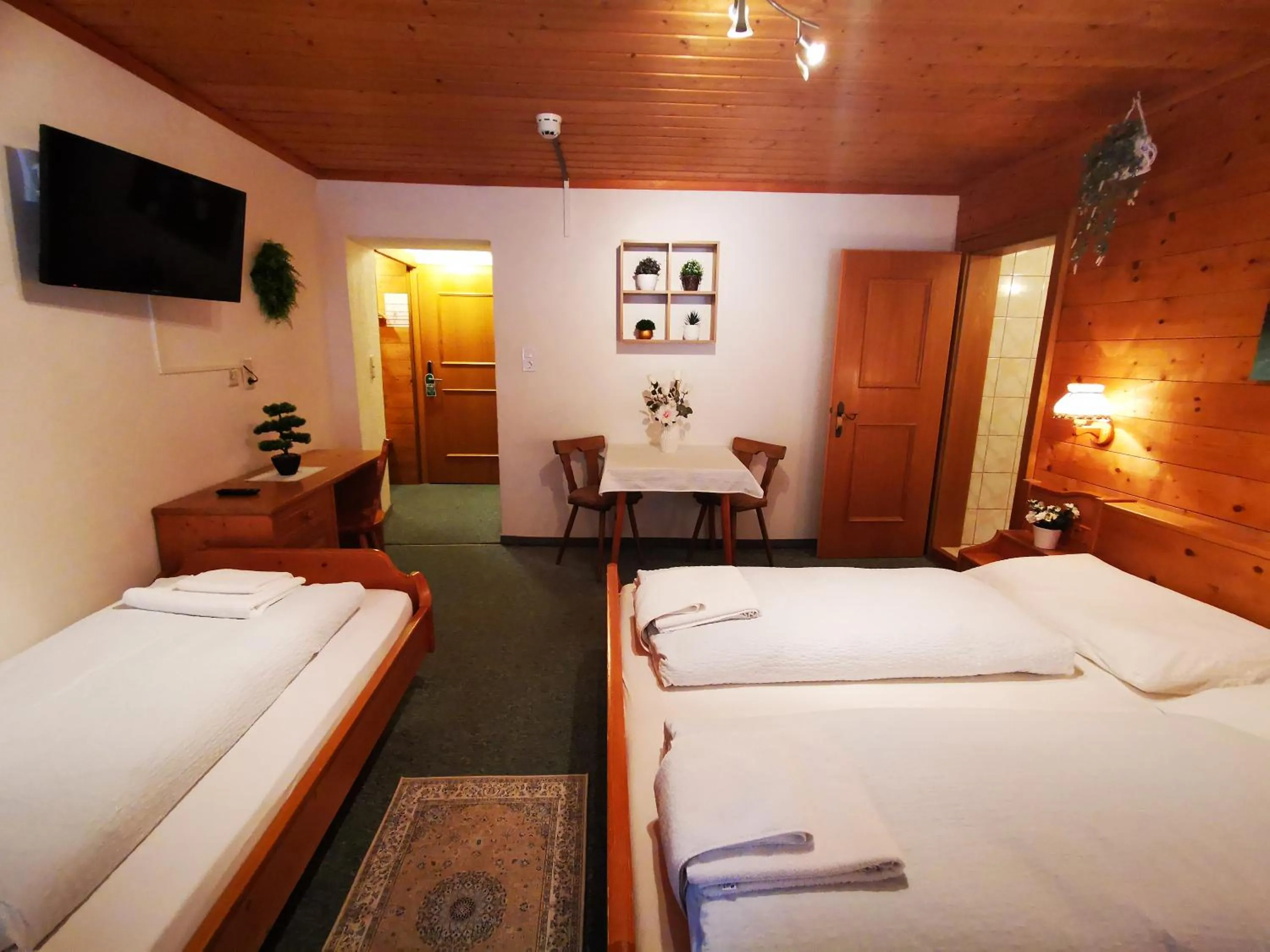 Photo of the whole room, Bed in Gasthof Geronimo