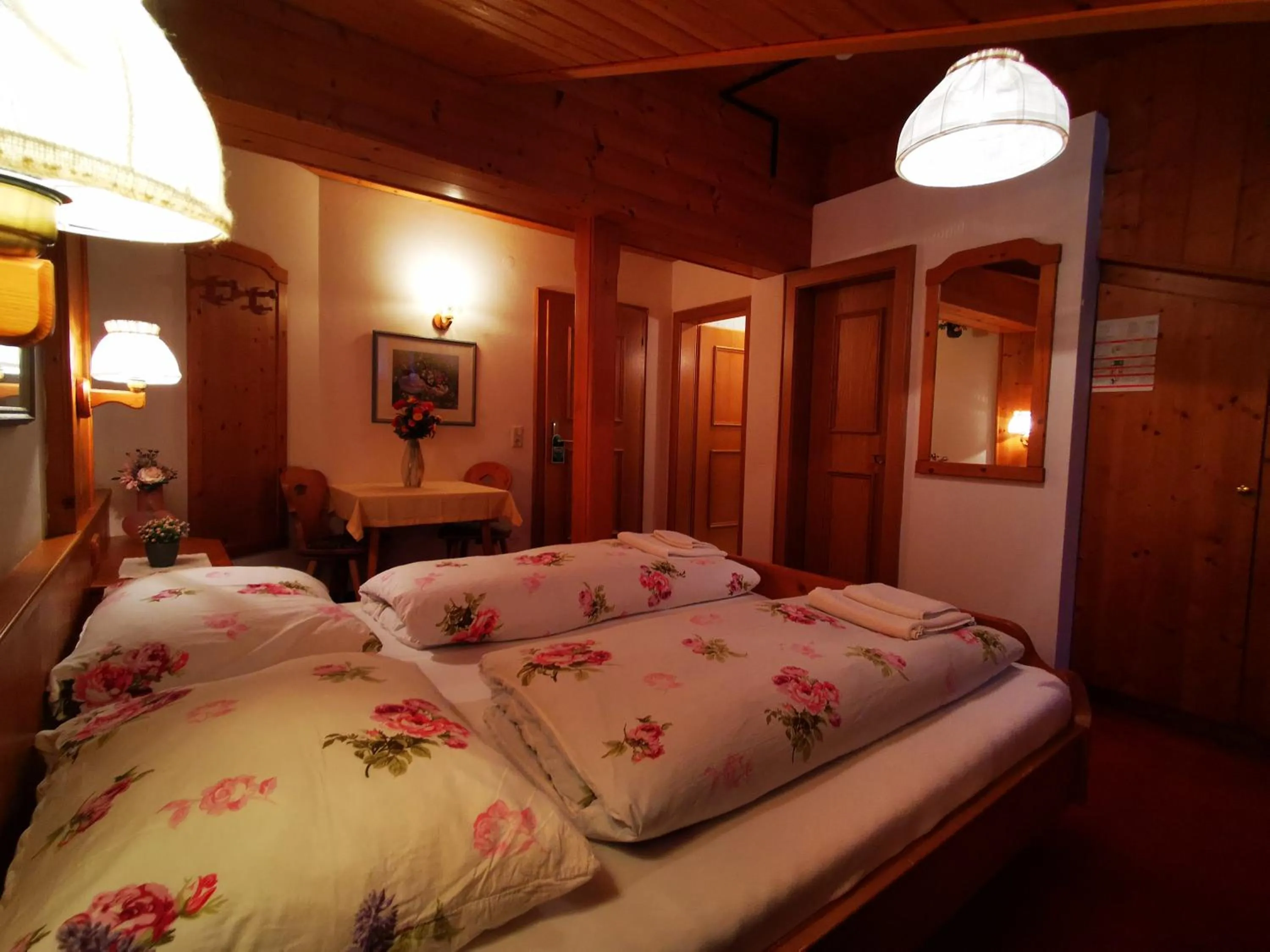 Photo of the whole room, Bed in Gasthof Geronimo