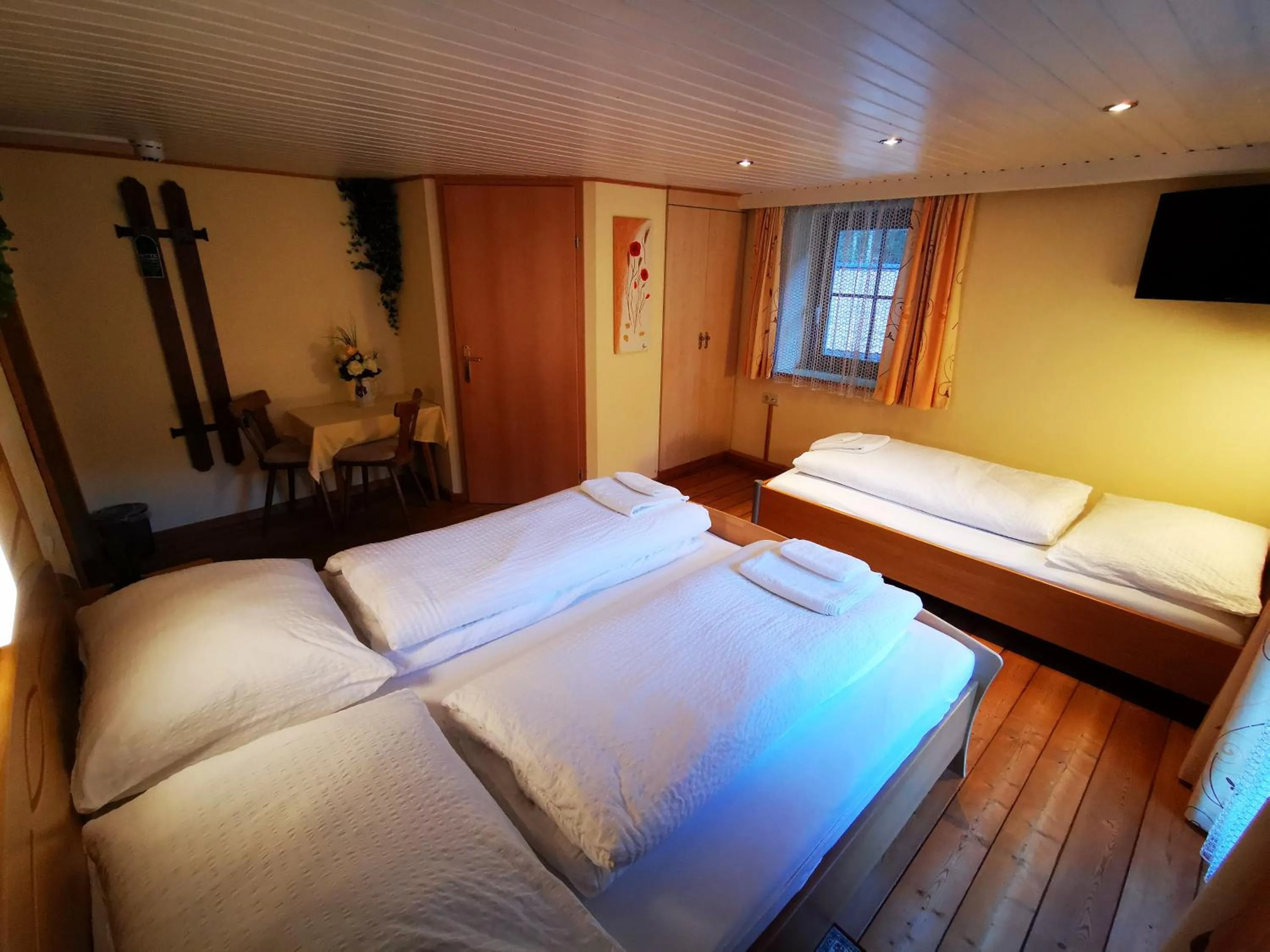 Photo of the whole room, Bed in Gasthof Geronimo