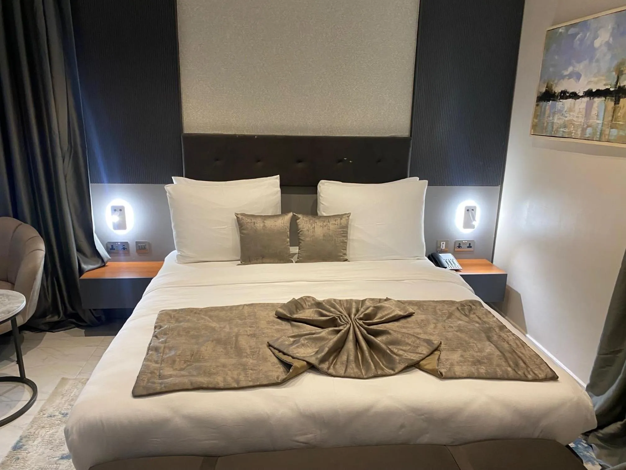 Bed in Wali's Suites