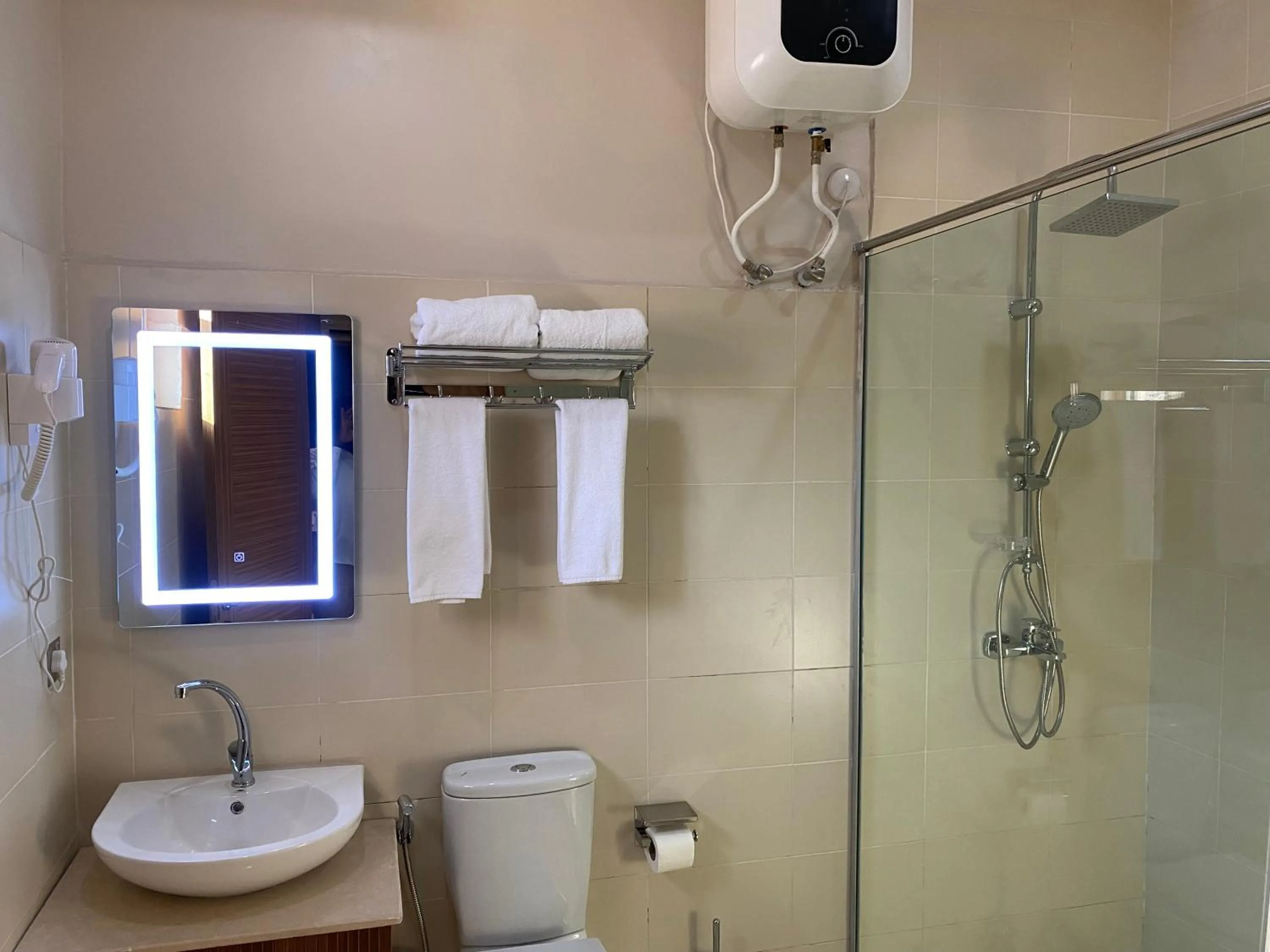 Shower in Wali's Suites