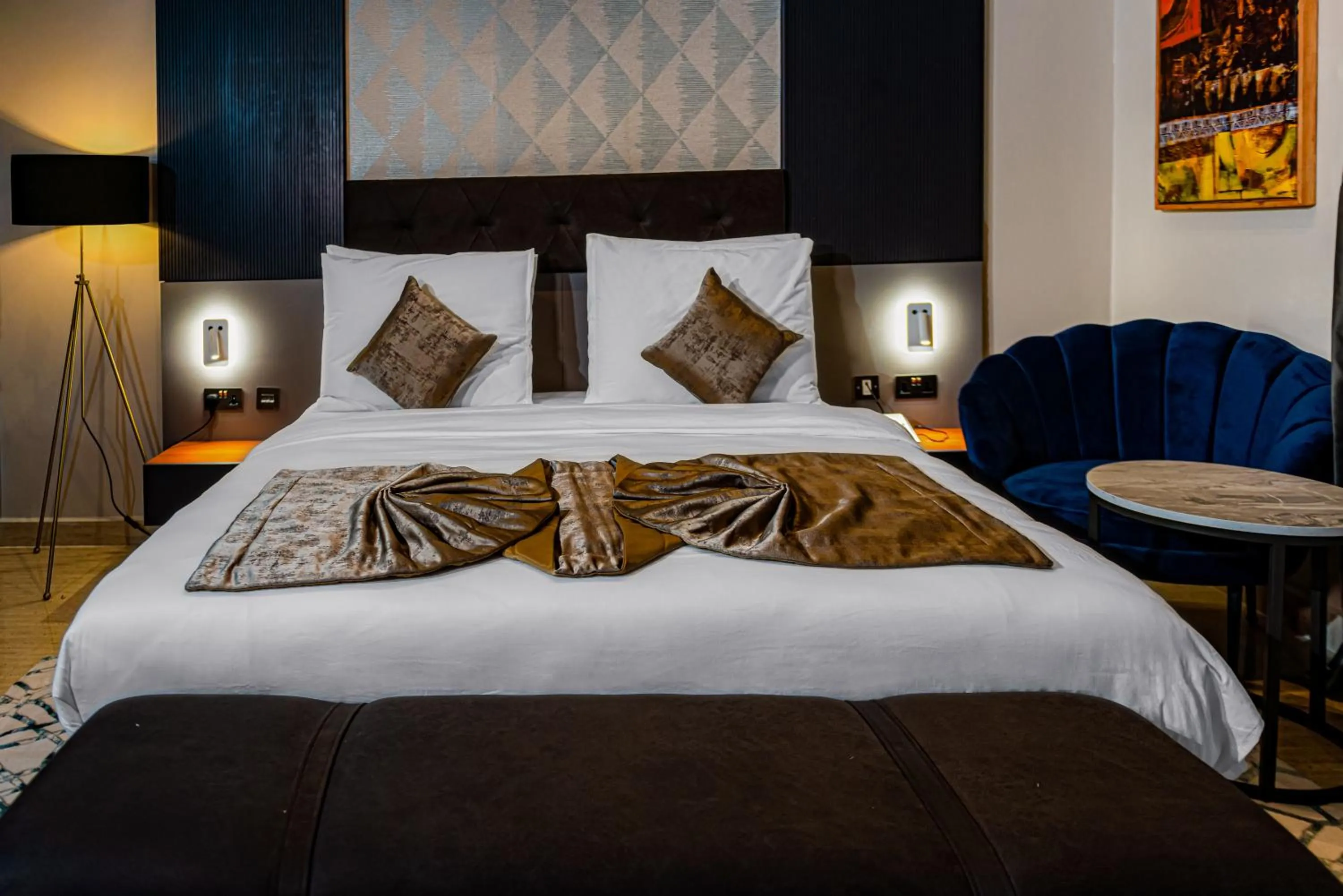 Bed in Wali's Suites