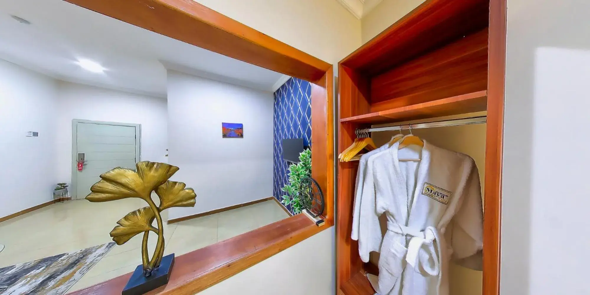 Deluxe Double Room (2 Adults + 1 Child) in Maya Villa Deluxe Double Room (2 Adults + 1 Child) in Maya Villa