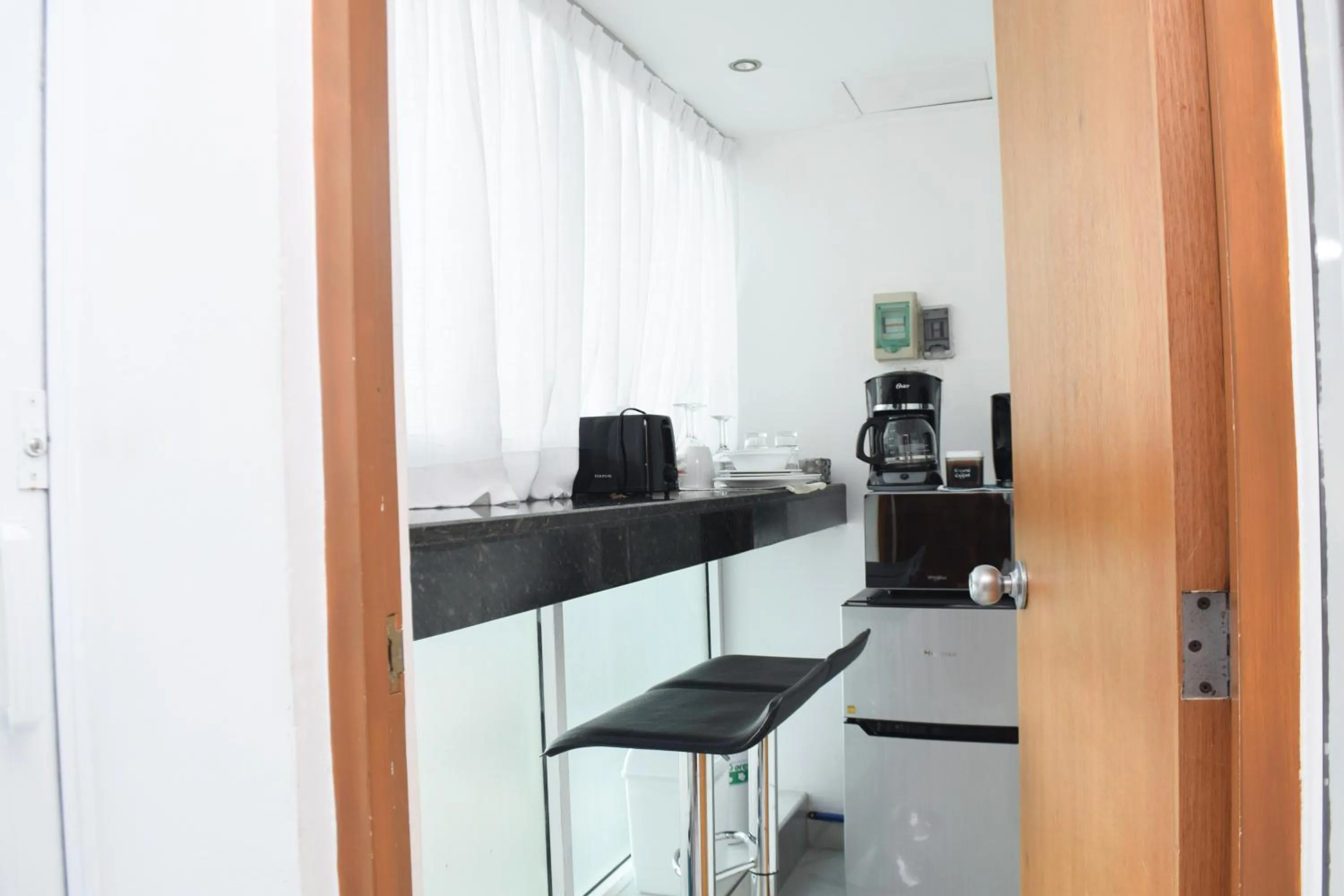 Kitchen or kitchenette in Estudio 4 sobre playa, alberca, gimnasio, jacuzzi