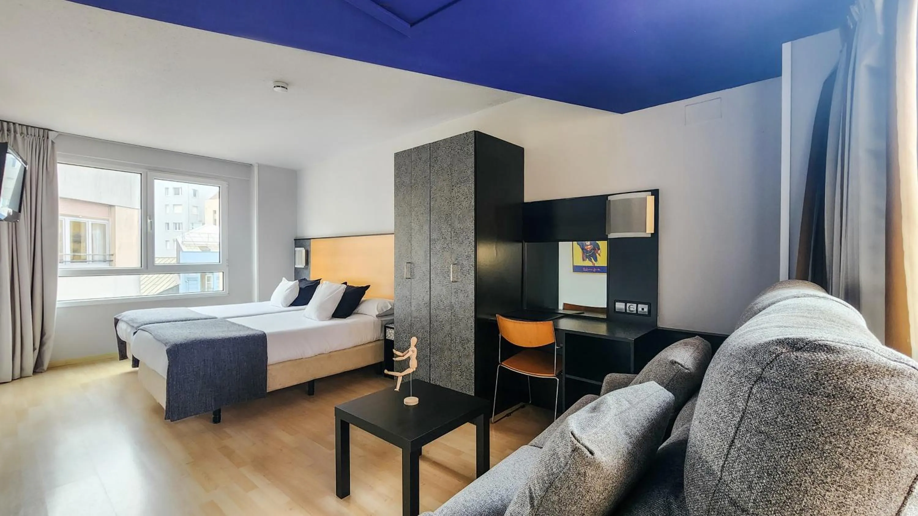 Communal lounge/ TV room in Hotel Faranda Pathos Gijón, Ascend Hotel Collection