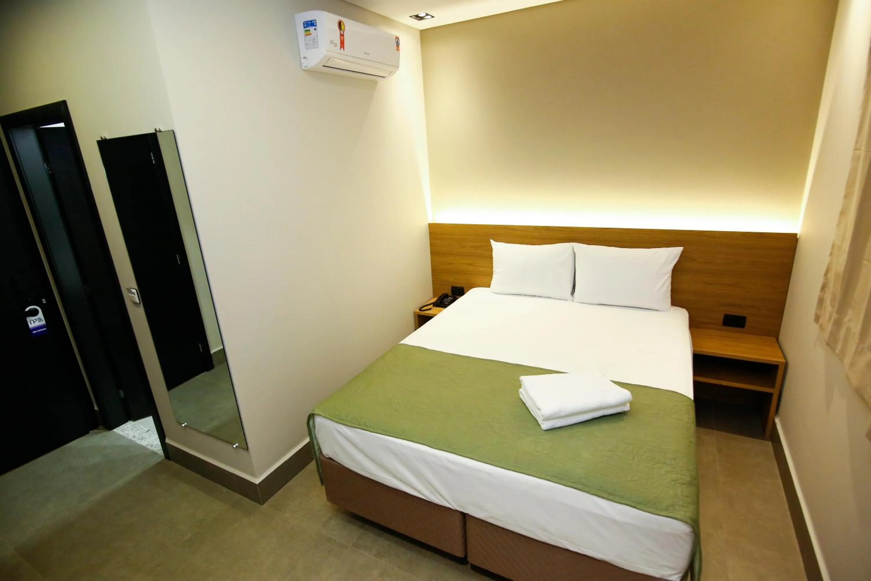 Bed in NEO PARK HOTEL