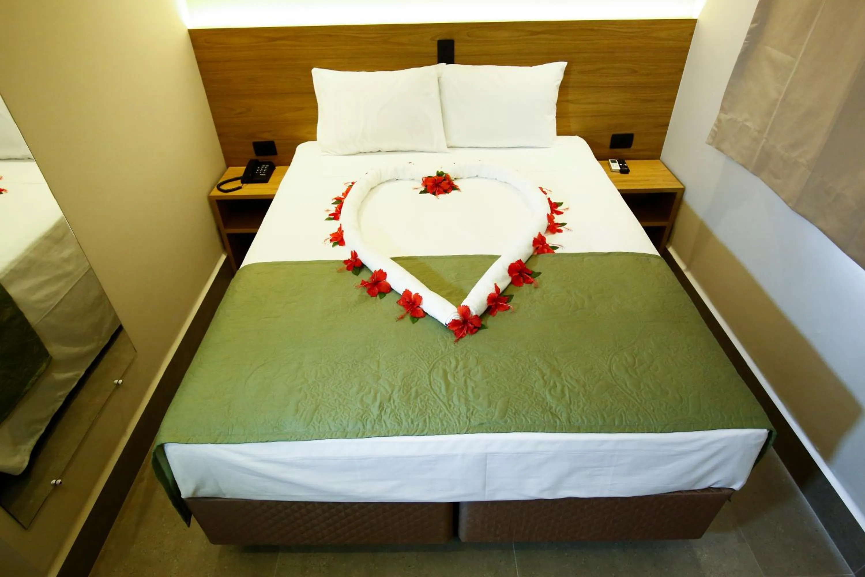 Bed in NEO PARK HOTEL