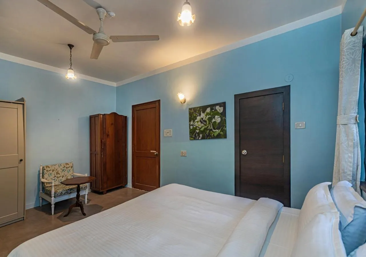 Bed in SaffronStays Oriana, Alibaug