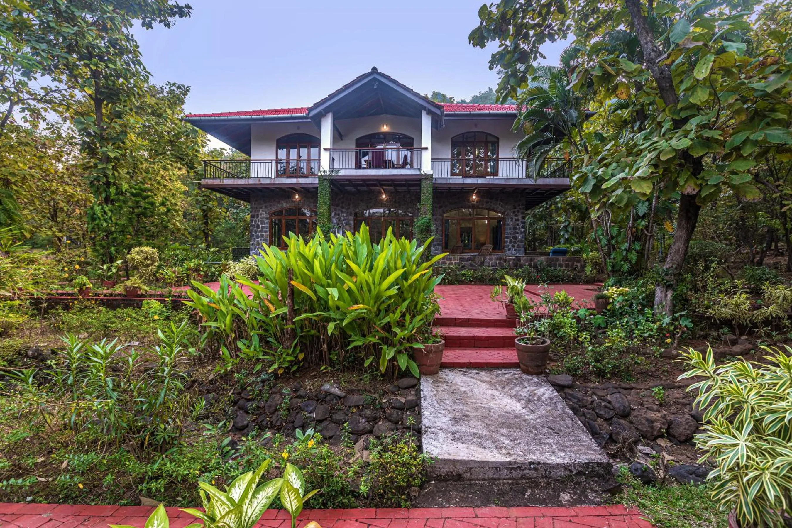 Property building in Saffronstays Alma Grove 3 BR Pet friendly with Pool & Nature View