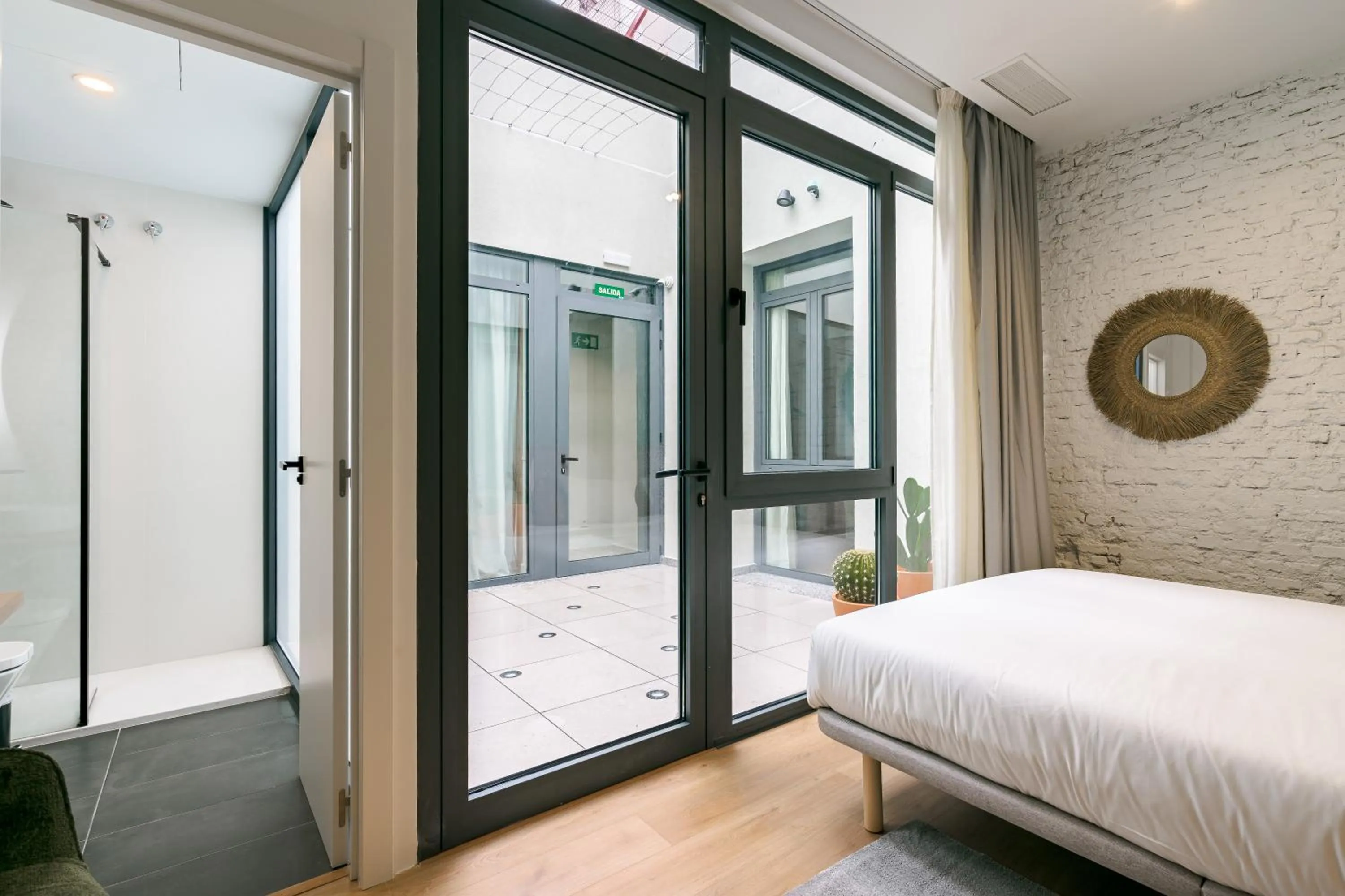 Photo of the whole room, Bed in Vallecas Suites by Olala Homes