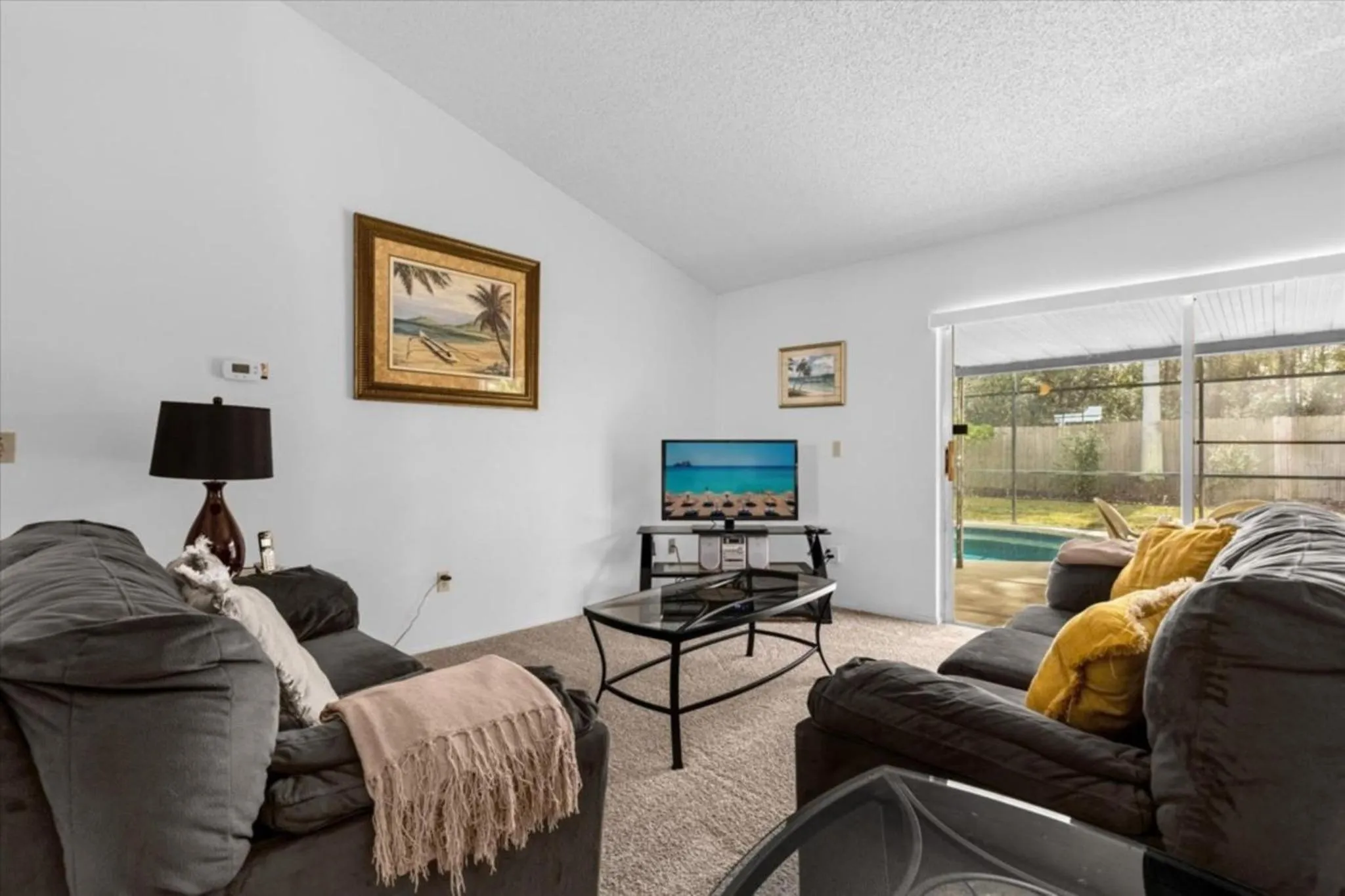 Living room in 4 Bedroom Value Plus Home with Private Pool