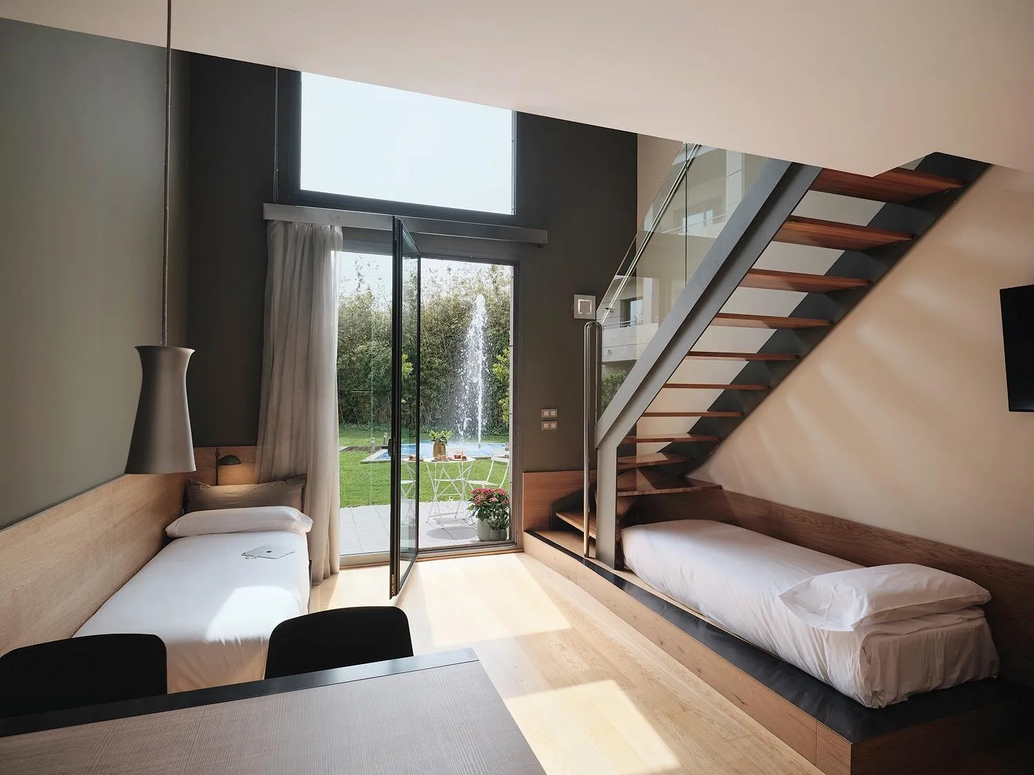 Living room, Bed in Qgat Restaurant Events & Hotel