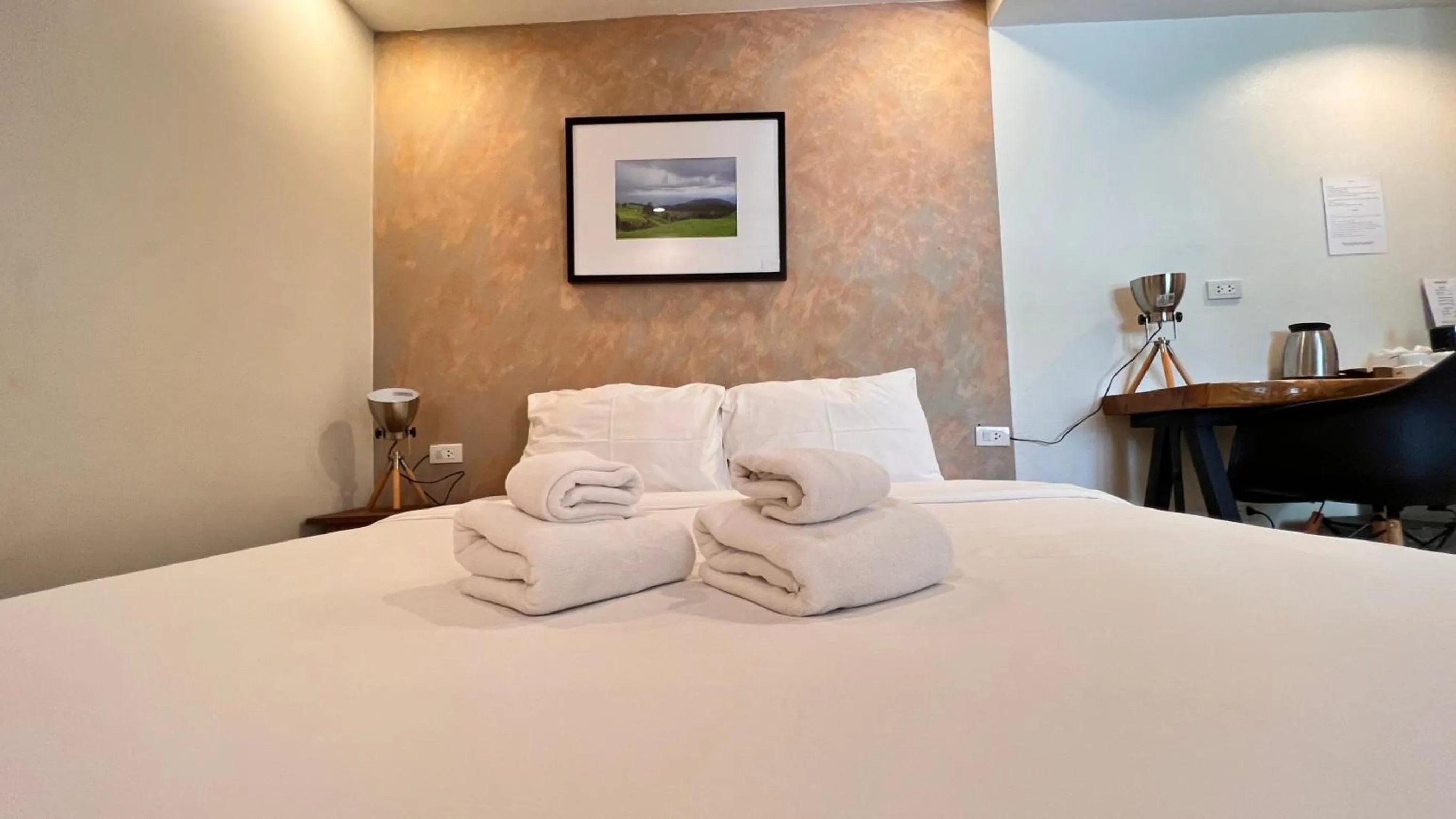 Bed in UDEE Cozy Hotel