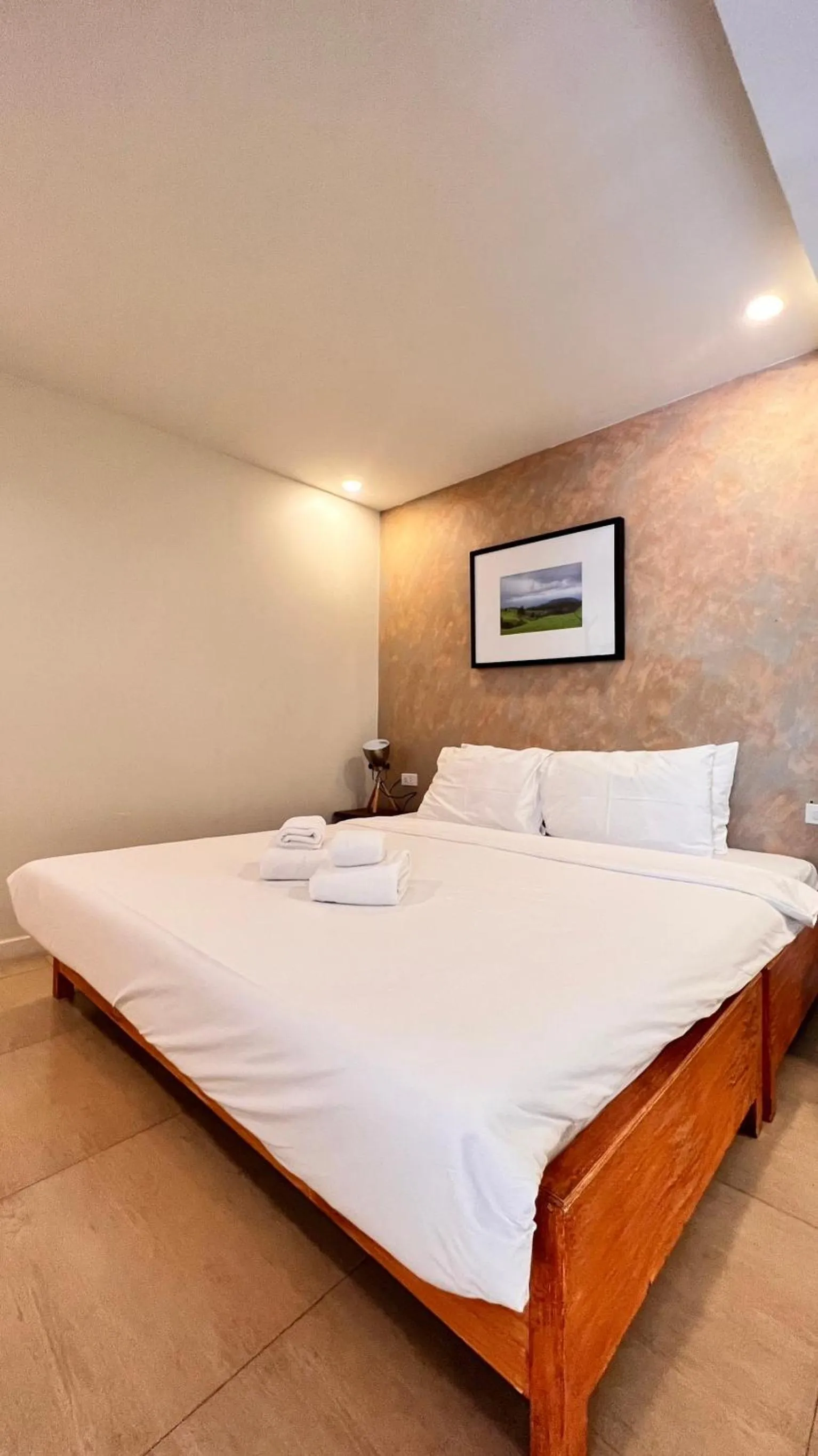 Bed in UDEE Cozy Hotel