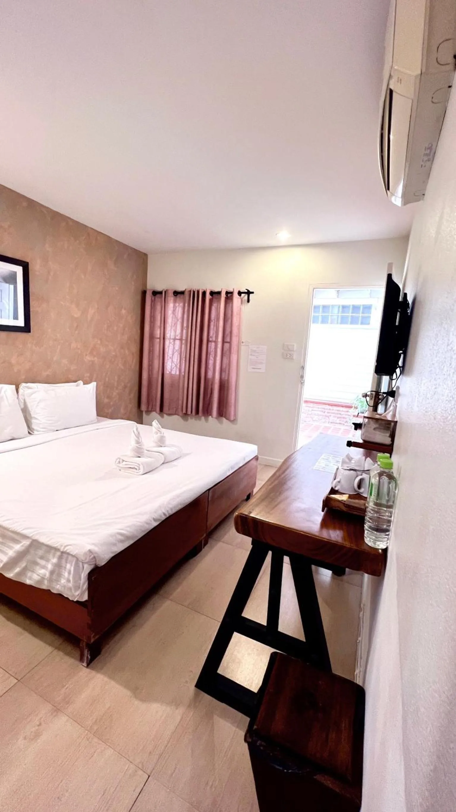 Bed in UDEE Cozy Hotel