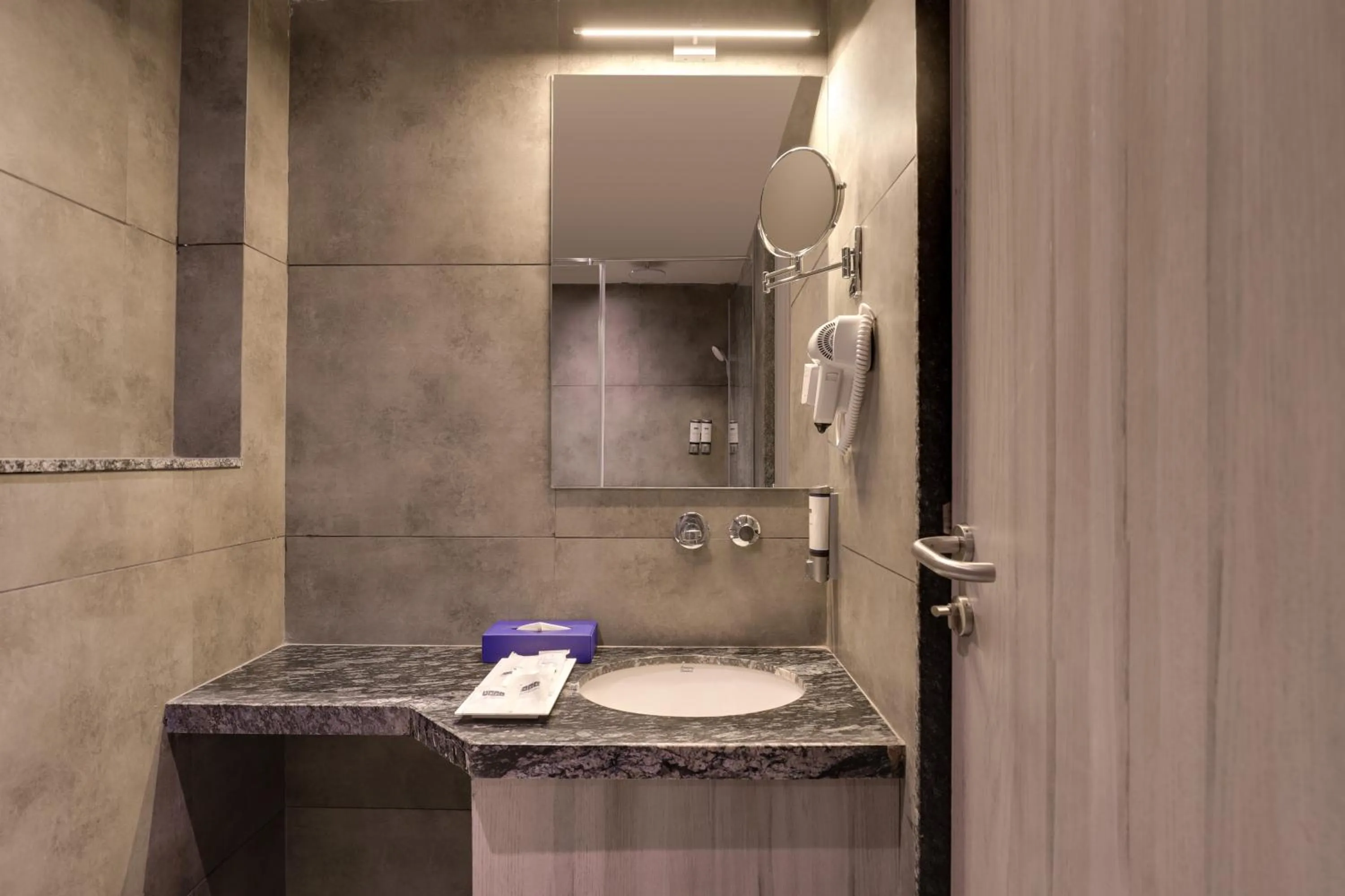 Bathroom in Keys Lite by Lemon Tree Hotels, Vadodara
