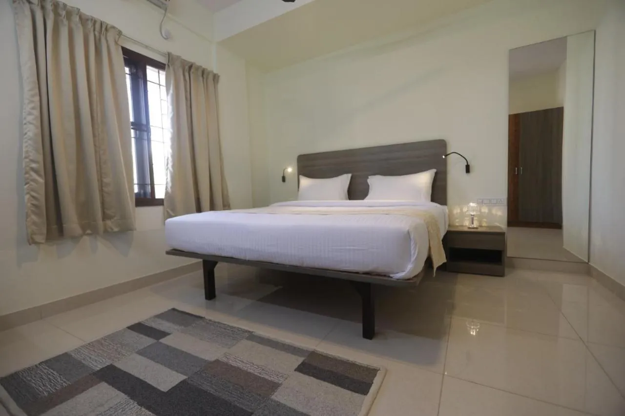 Bed in Elysian Grand Hotel