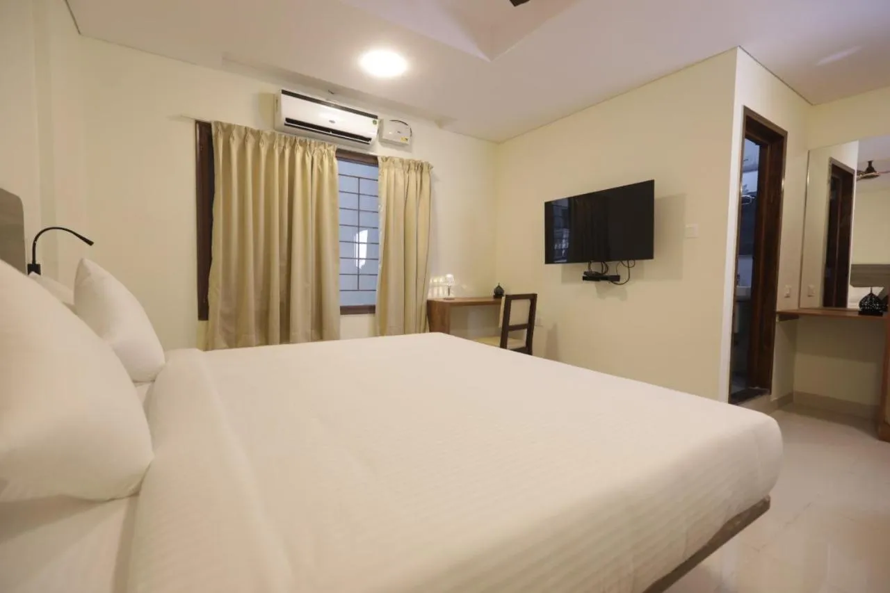 Bed in Elysian Grand Hotel