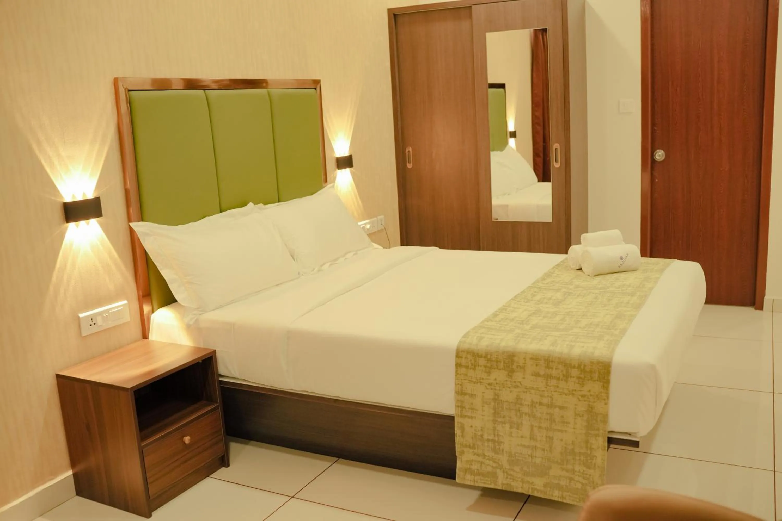 Bed in ESQUINA RESIDENCY