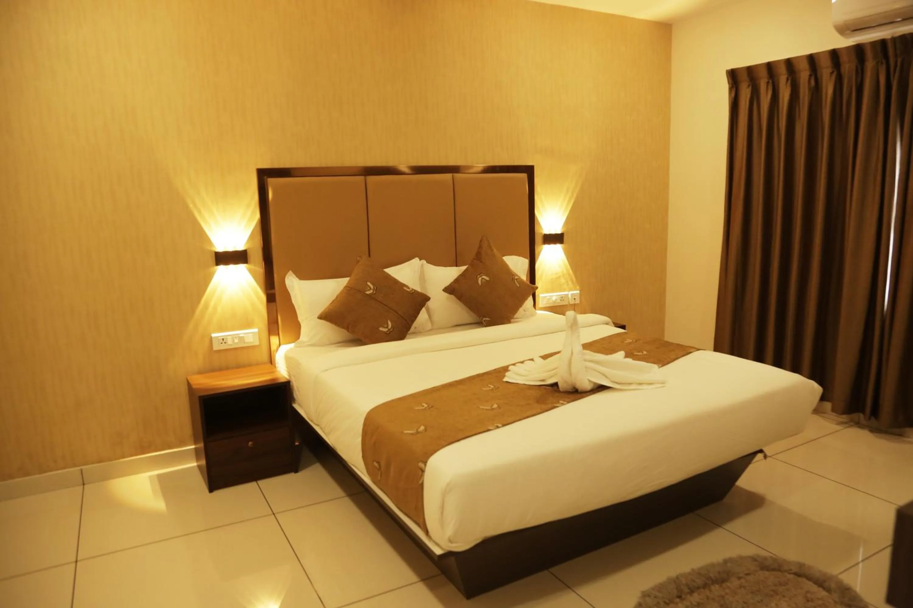 Bed in ESQUINA RESIDENCY