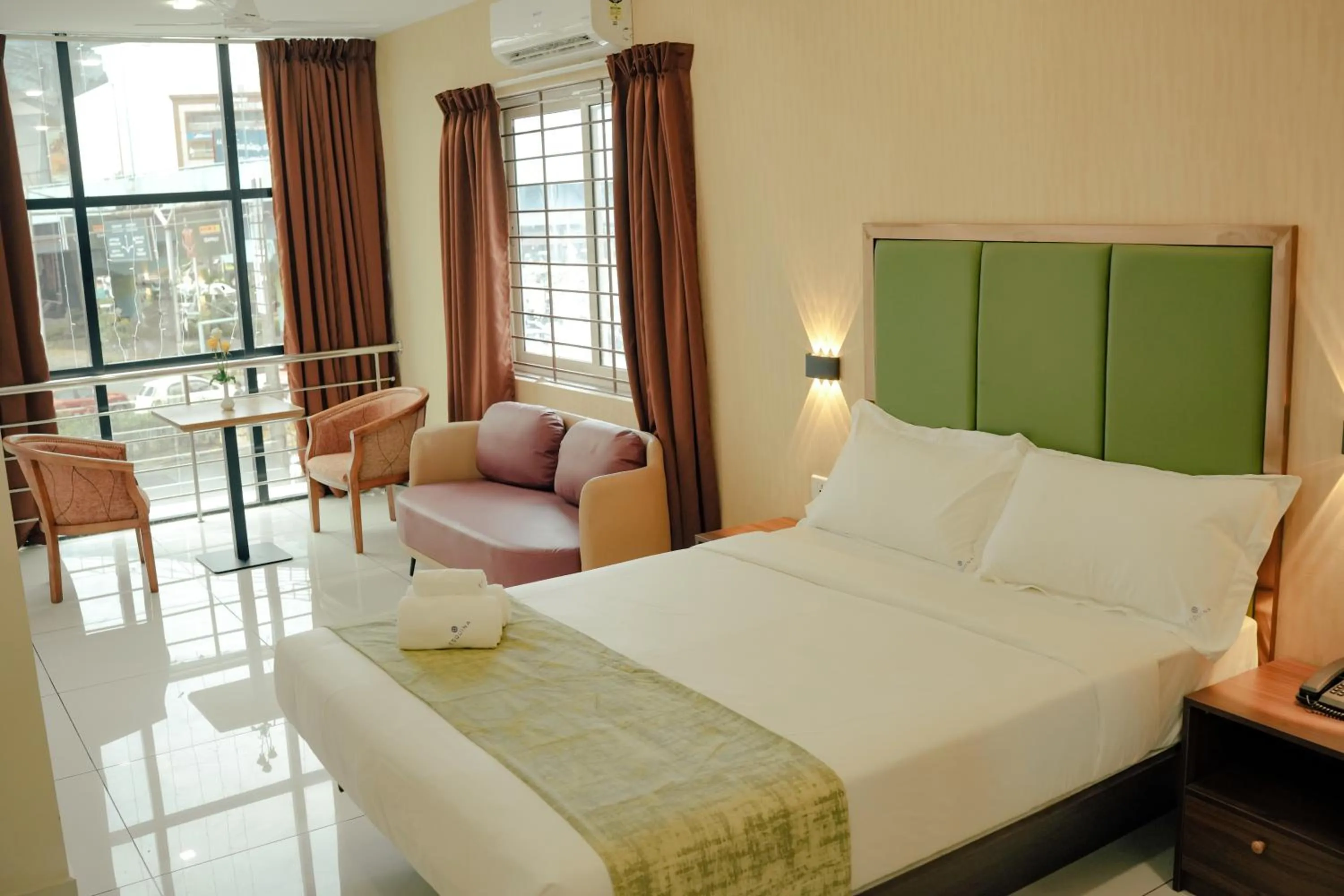 Bed in ESQUINA RESIDENCY