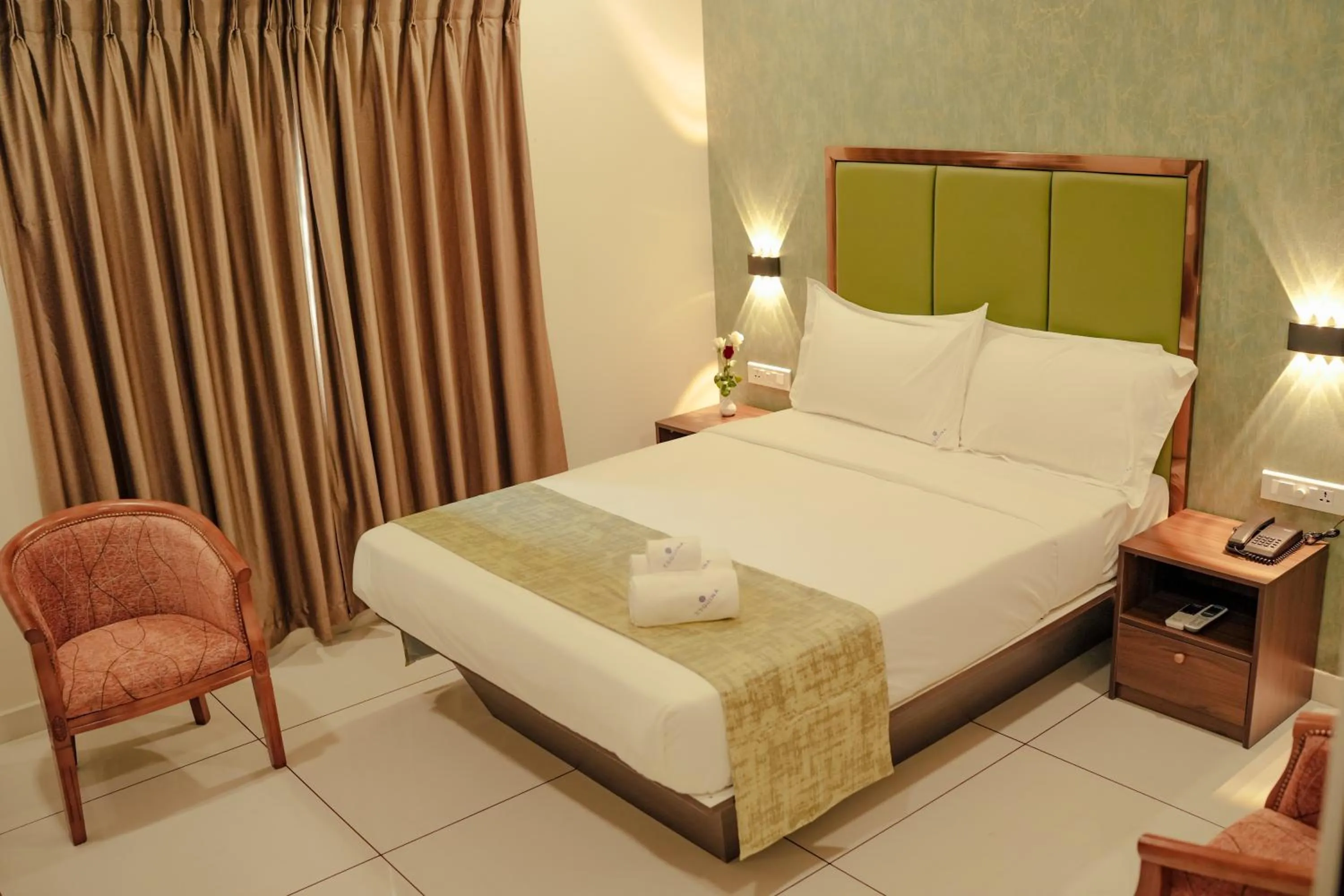 Bed in ESQUINA RESIDENCY