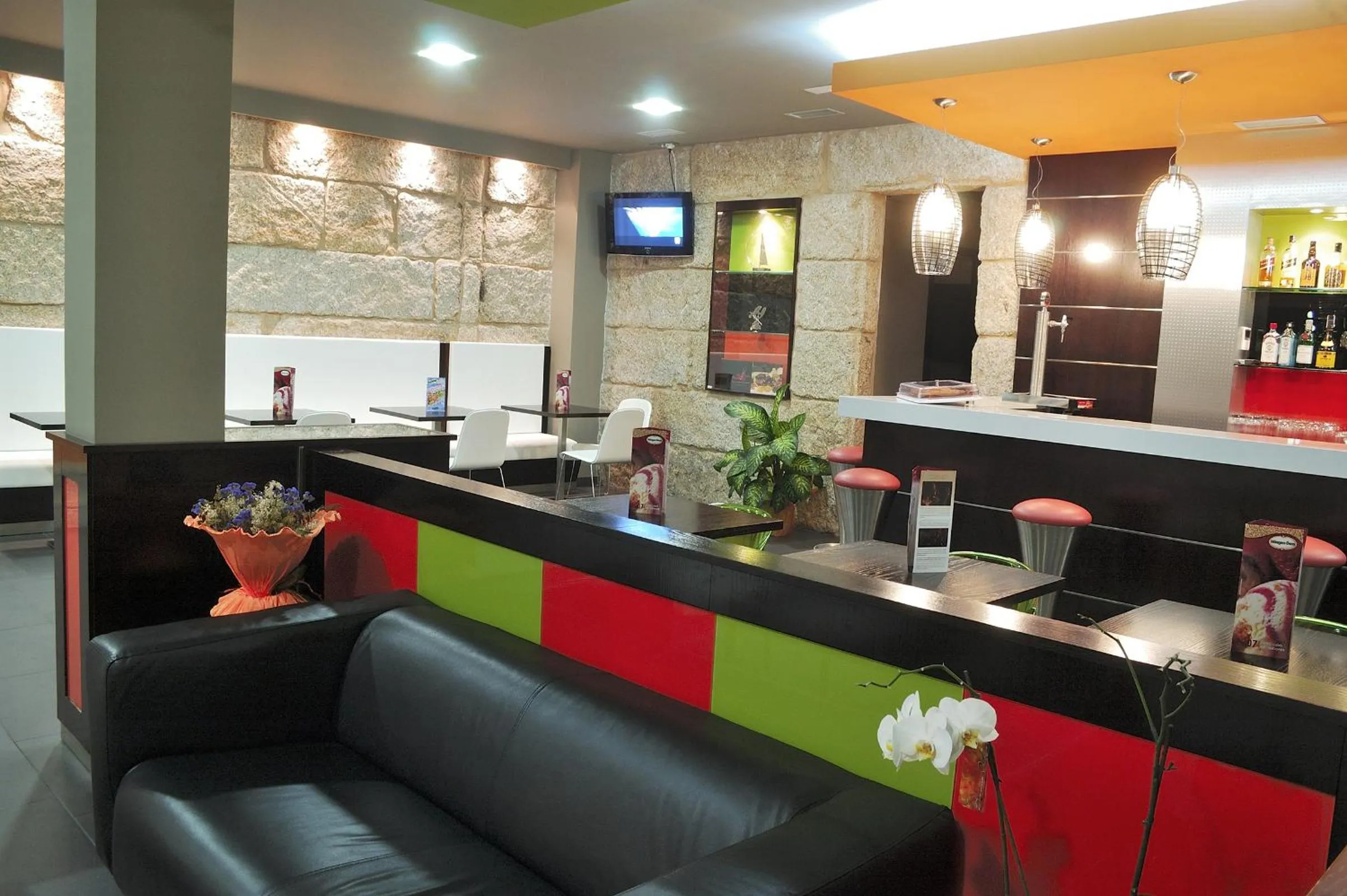 Communal lounge/ TV room in Hotel Puente de La Toja