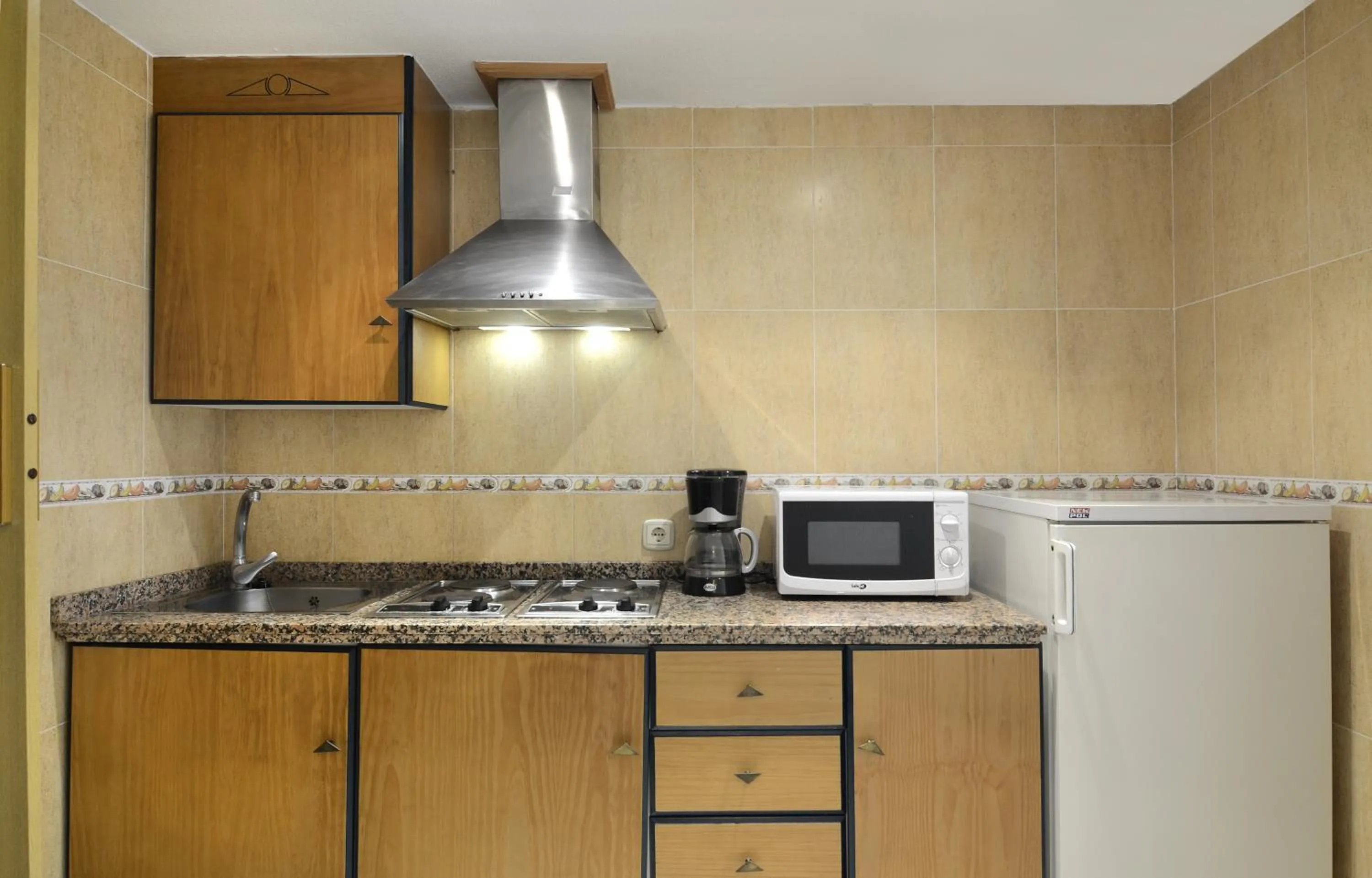 Kitchen or kitchenette in Hotel Apartamentos Pyr Fuengirola