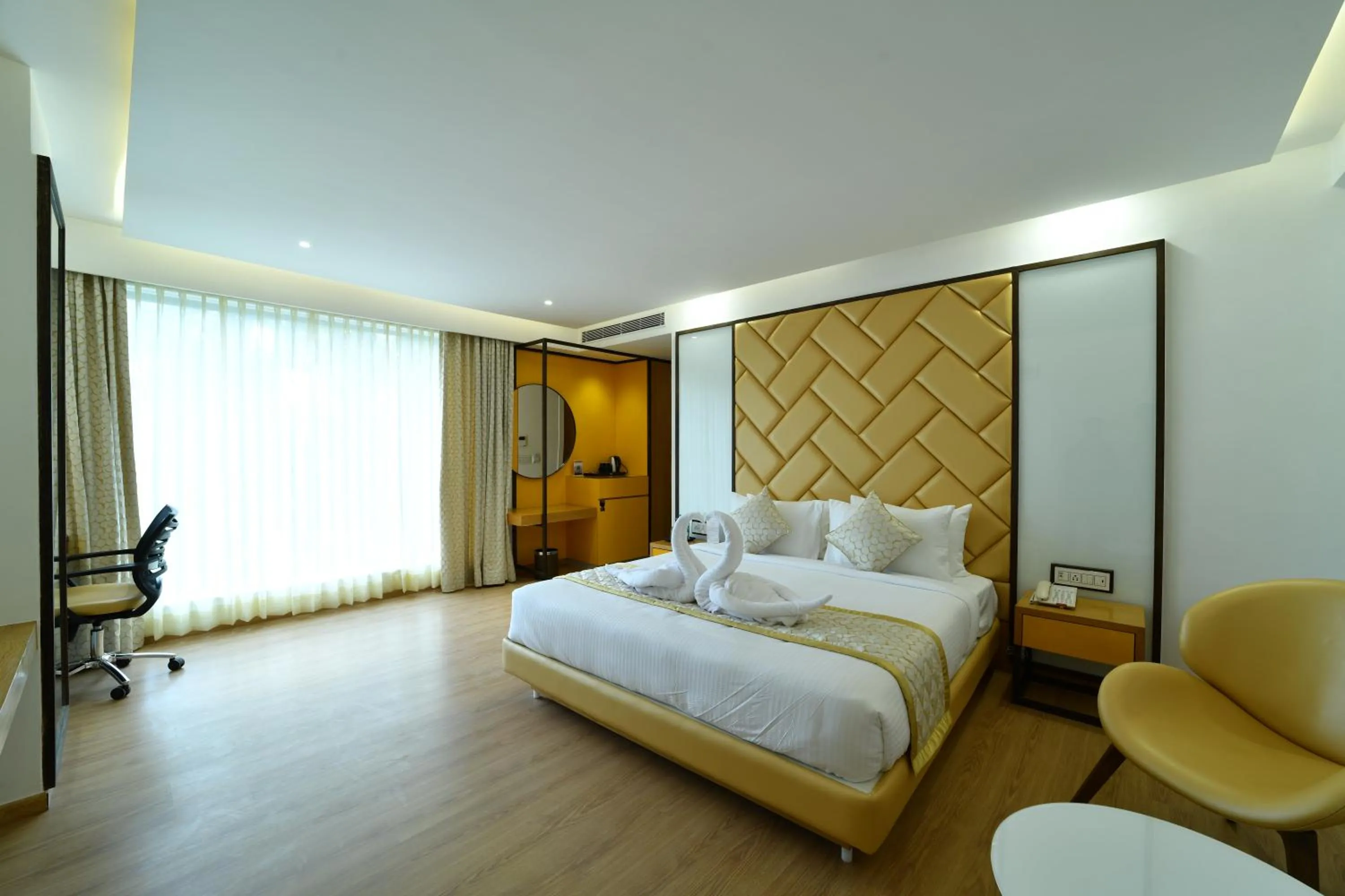 Photo of the whole room, Bed in The President Hotel, kumarapark