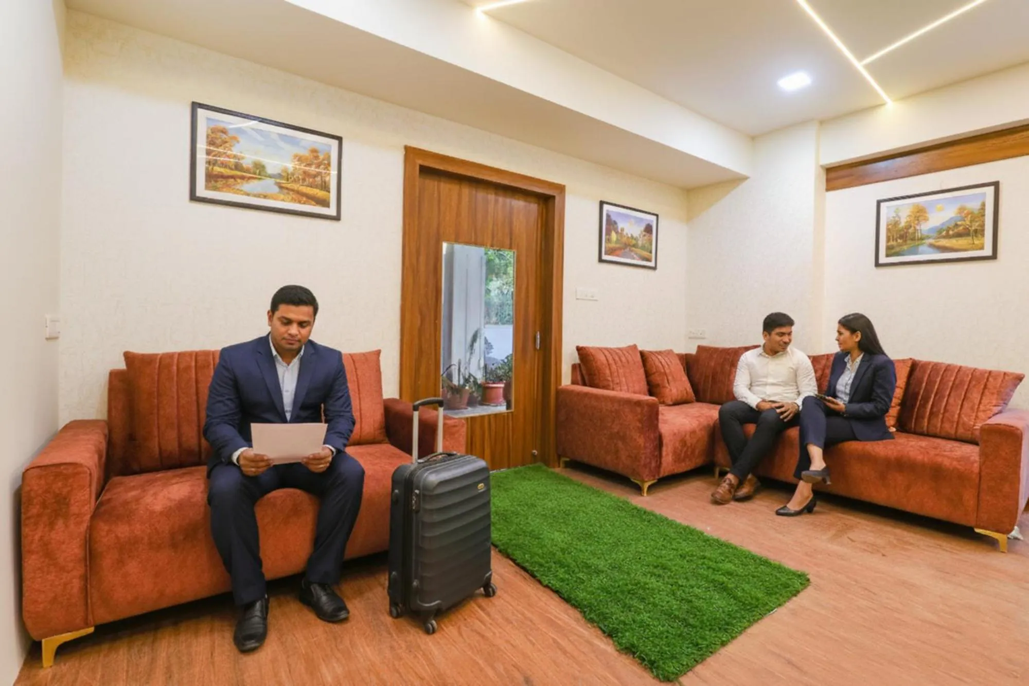 Seating area in FabHotel E City Inn - 3km from Infosys Campus