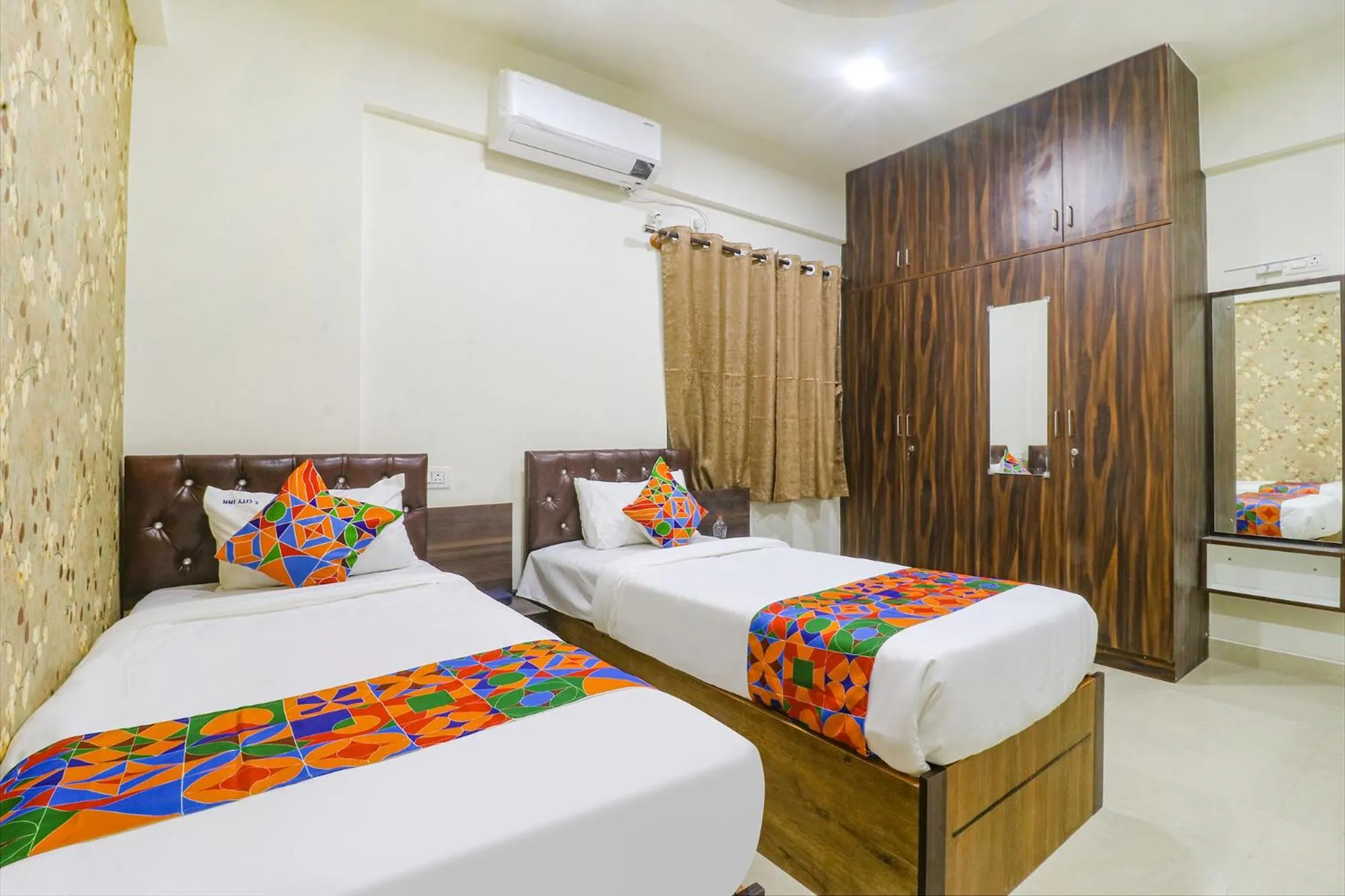 Photo of the whole room, Bed in FabHotel E City Inn - 3km from Infosys Campus