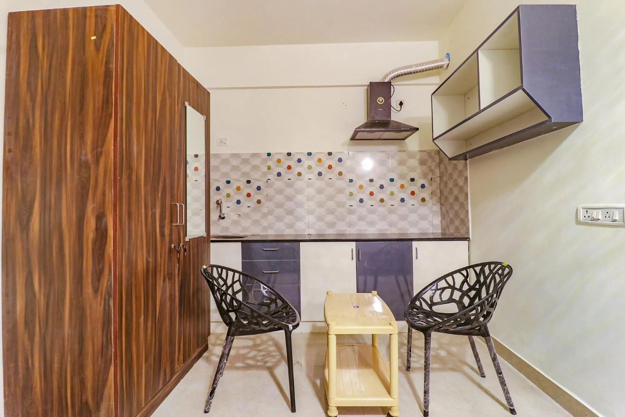 Kitchen or kitchenette in FabHotel E City Inn - 3km from Infosys Campus