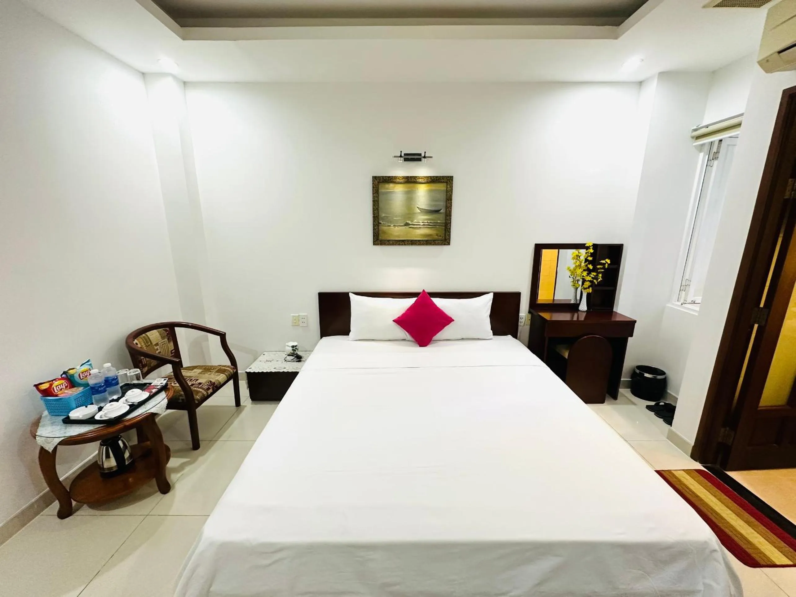 Bed in REDFLOWER HOTEL