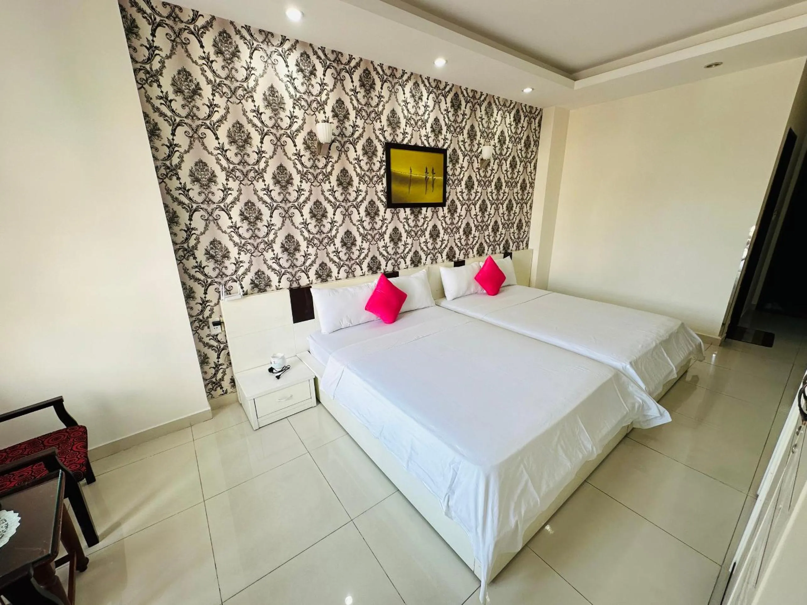 Bed in REDFLOWER HOTEL