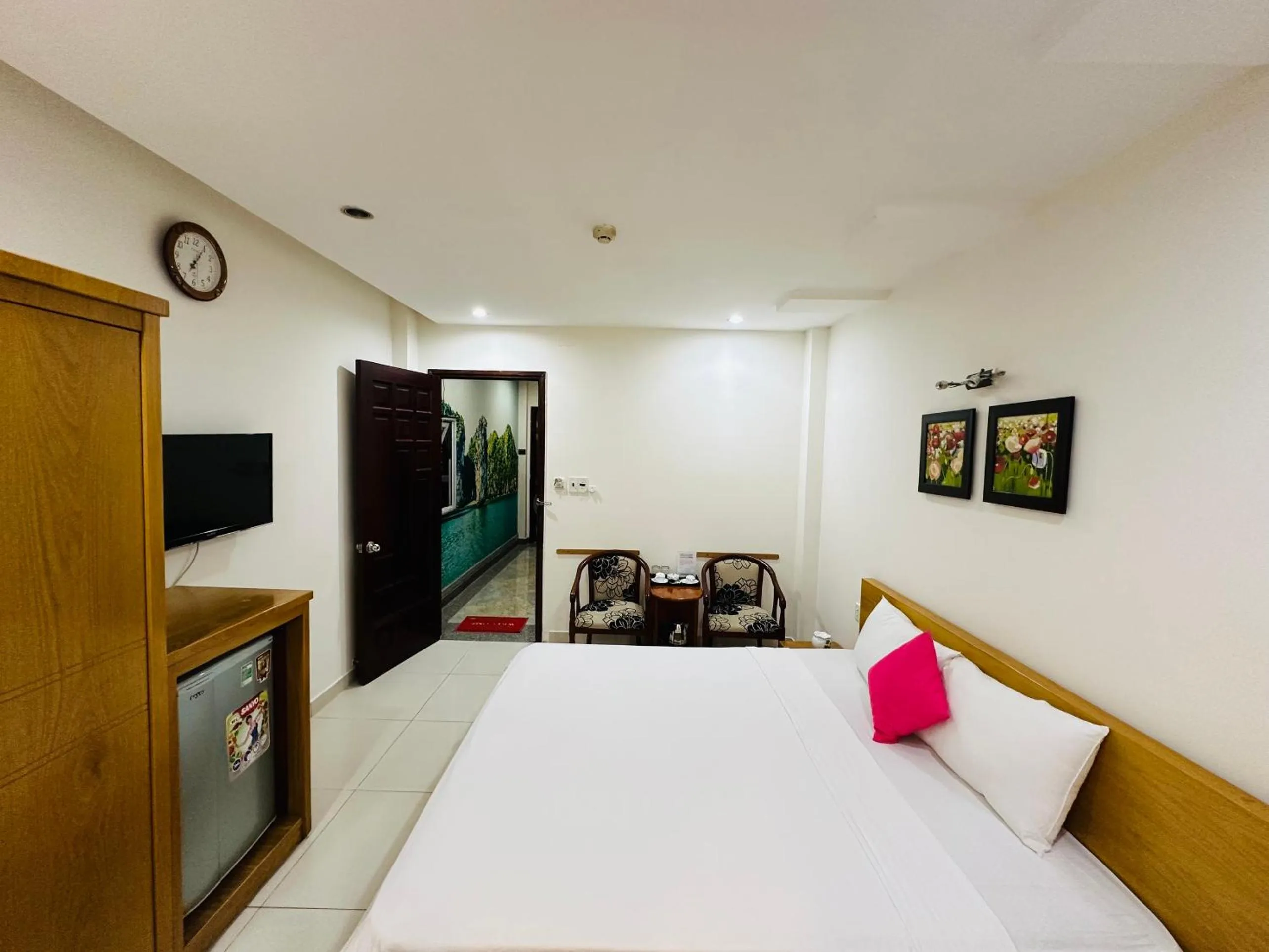 Bed in REDFLOWER HOTEL