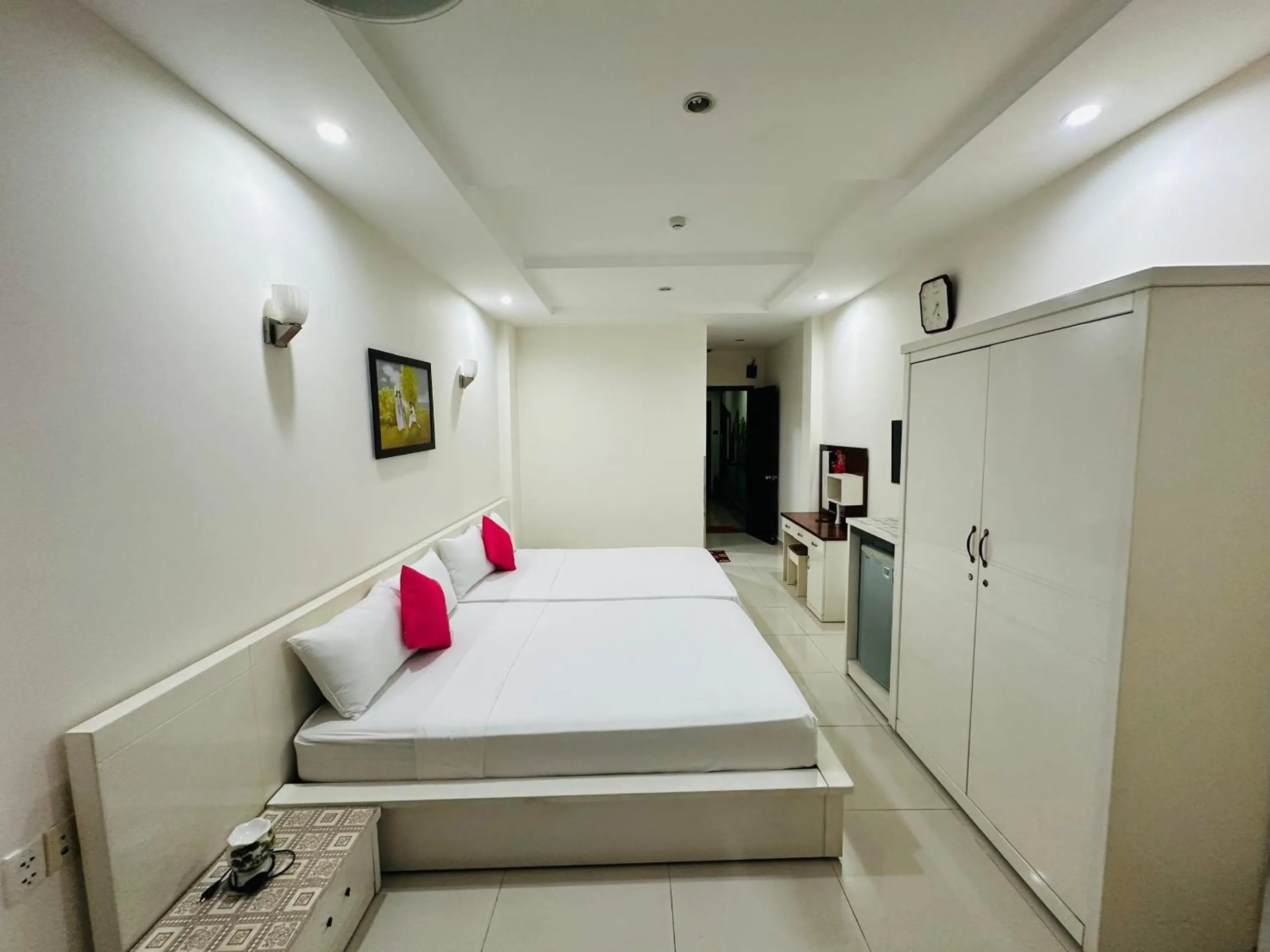 Bed in REDFLOWER HOTEL