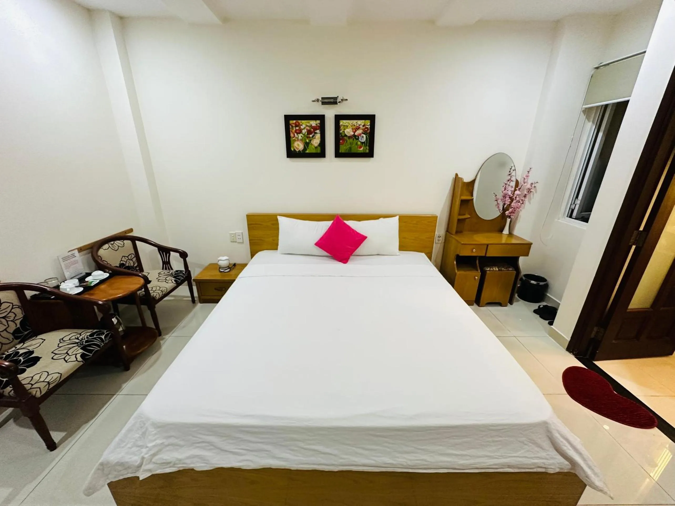 Bed in REDFLOWER HOTEL