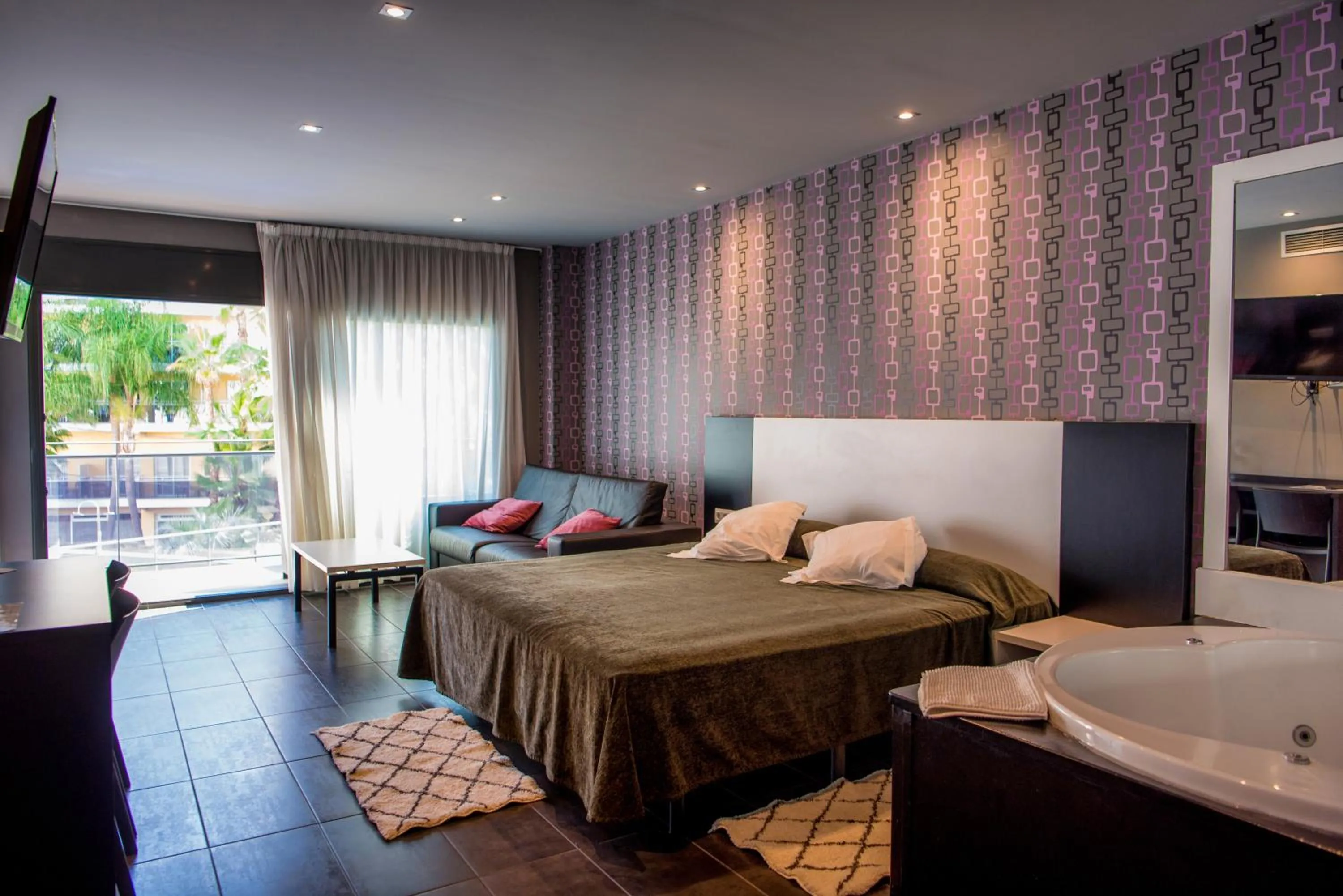 Bed in Hotel Acacias Suites & Spa