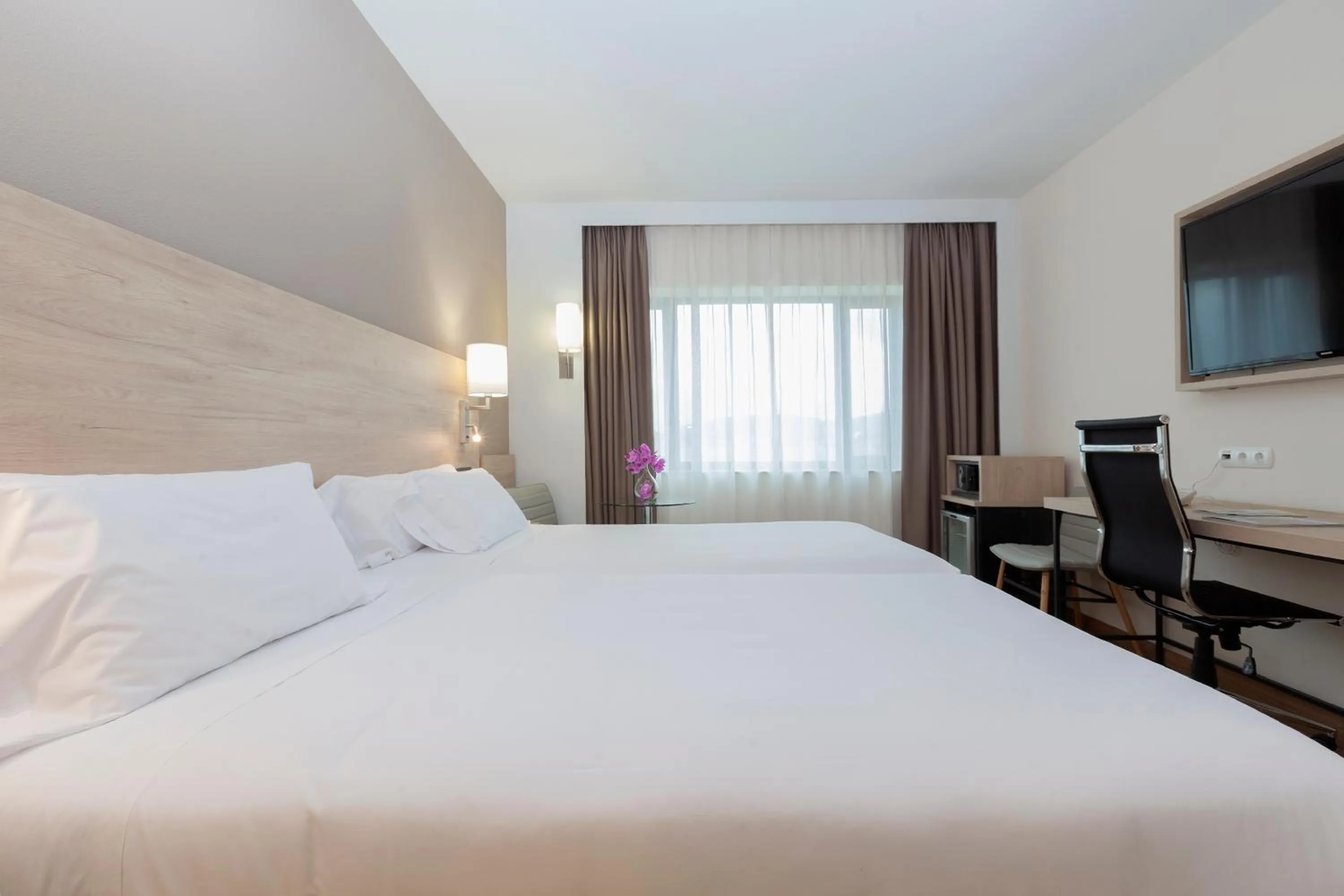 Bed in Hotel Puerta de Bilbao