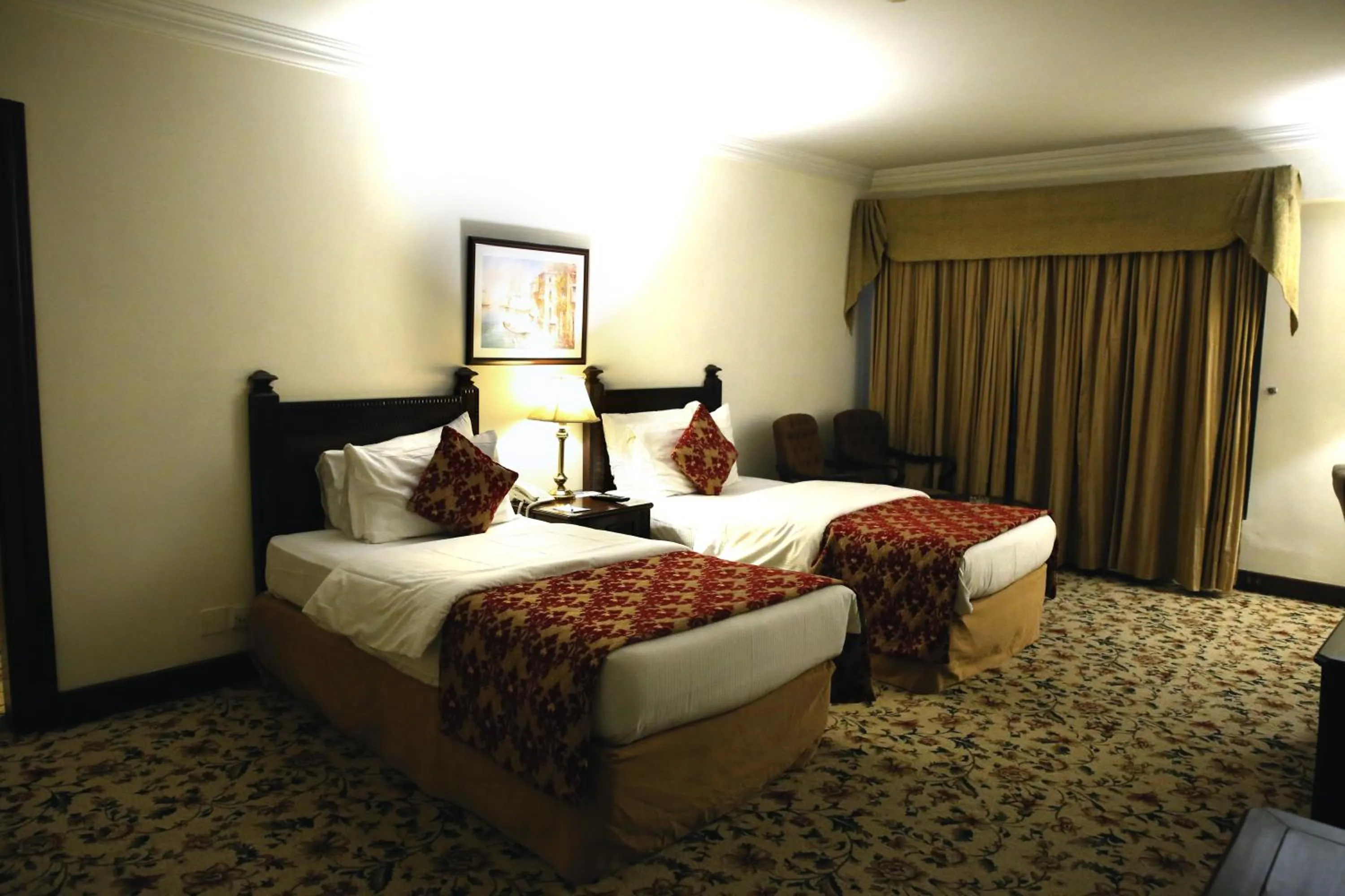 Bed in Hotel Hillview Islamabad