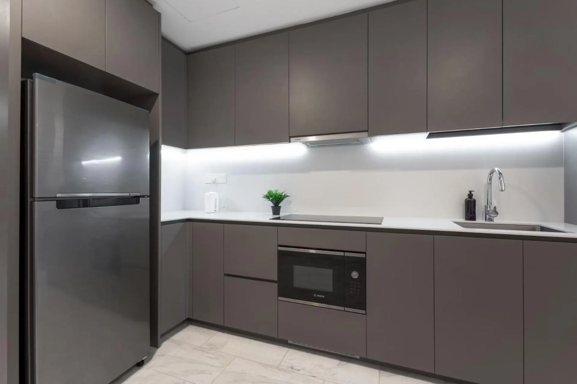 Kitchen or kitchenette in Eaton Residences KLCC by WSD