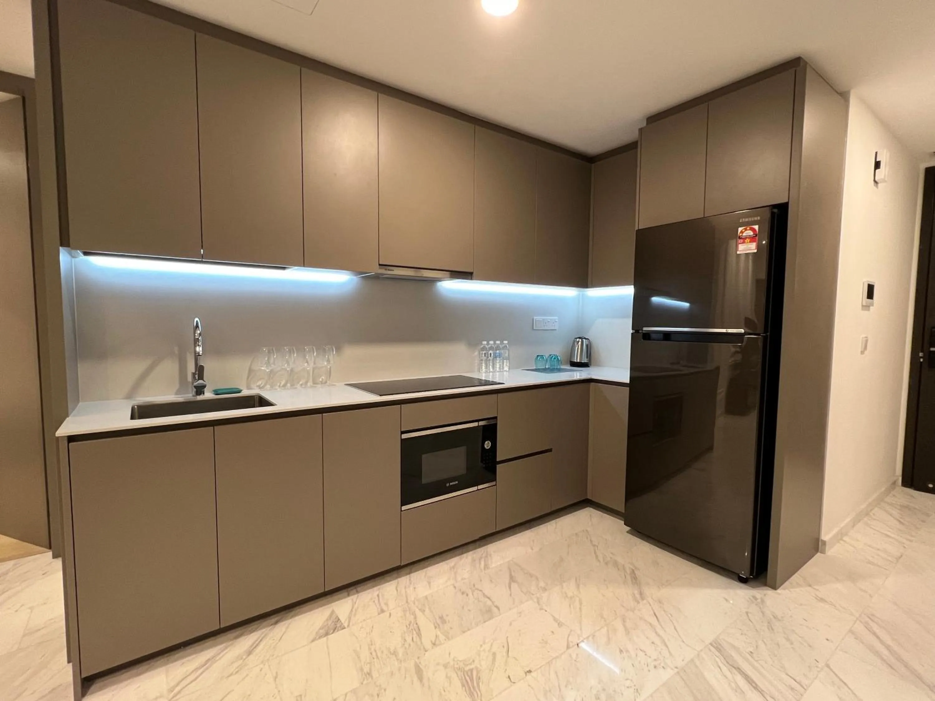 Kitchen or kitchenette in Eaton Residences KLCC by WSD