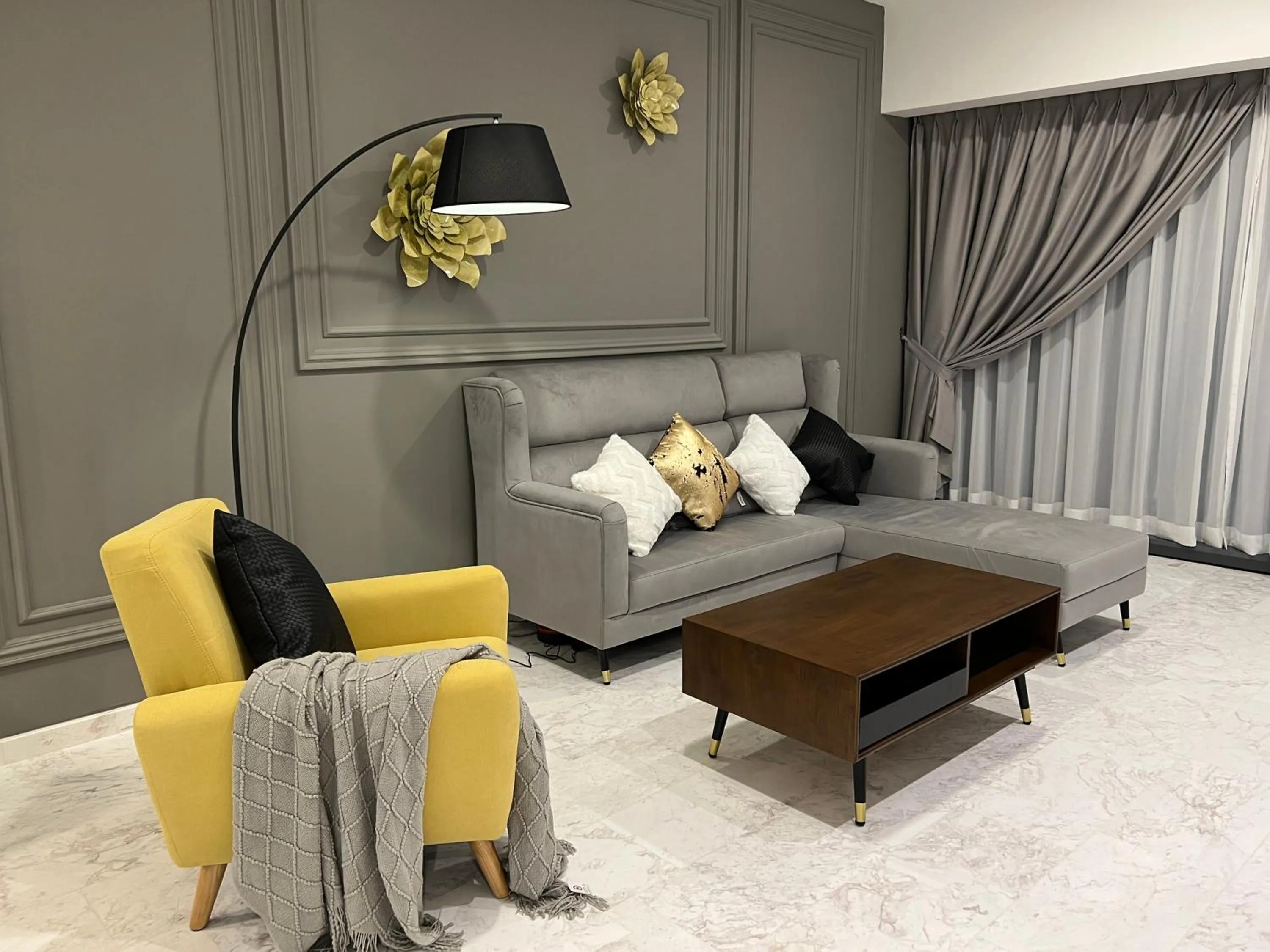 Living room in Eaton Residences KLCC by WSD